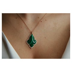 0.65 Carat Vs G Diamonds on 18 Carat Rose Gold Malachite Pendant