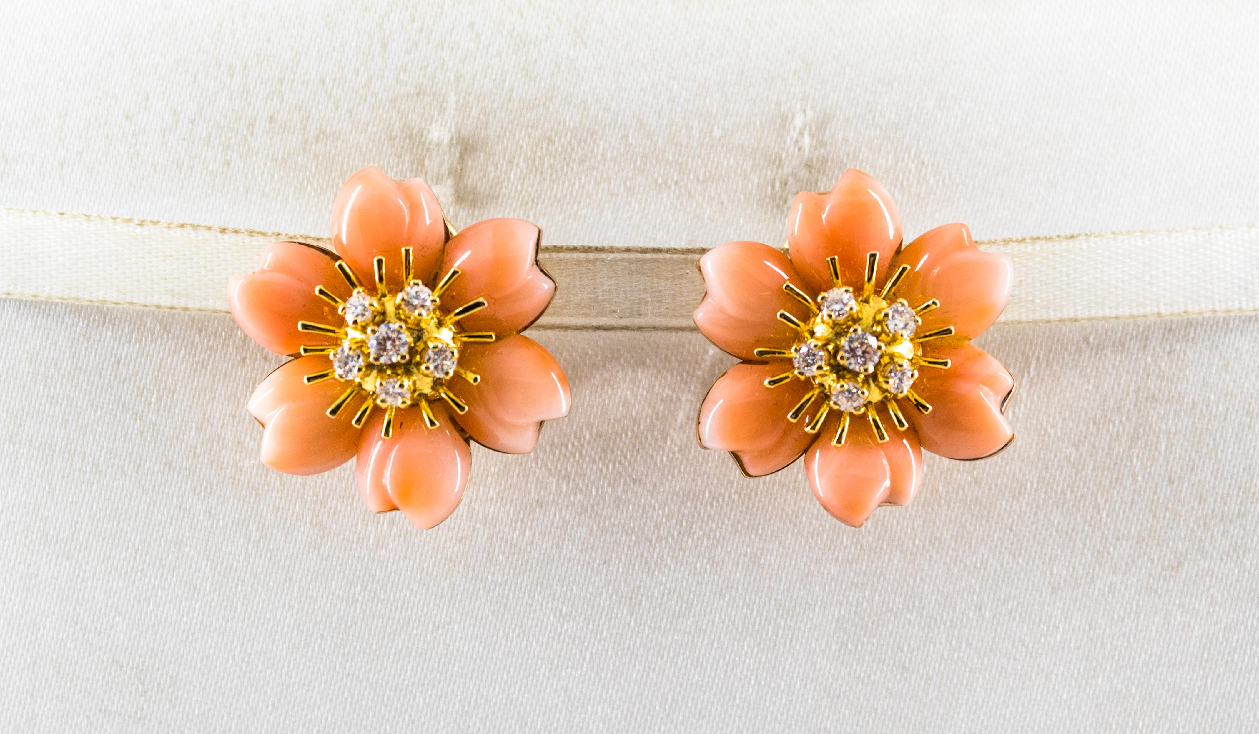 These Earrings are made of 14K Yellow Gold.
These Earrings have 0.65 Carats of White Diamonds.
These Earrings have Pink Coral.
These Earrings are available also in White Coral, Mediterranean Red Coral, Turquoise or Lapis Lazuli.
These Earrings are