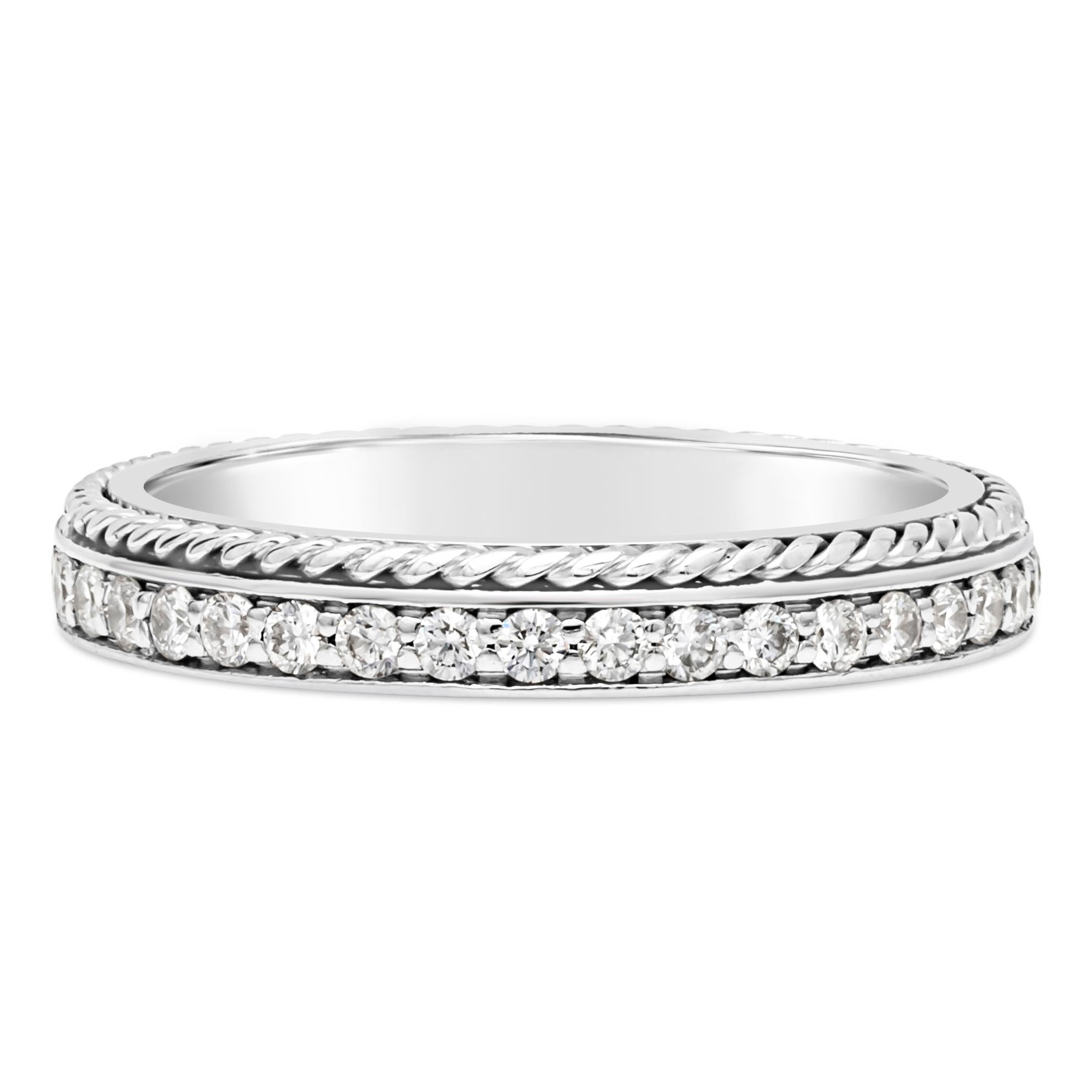This channel set wedding band ring embellished with dazzling 37 round brilliant diamonds weighing 0.65 carats total, F color and VS-SI in clarity. Set in a bright cut with braid on one side of the ring for an elegant and antique finish. Made with