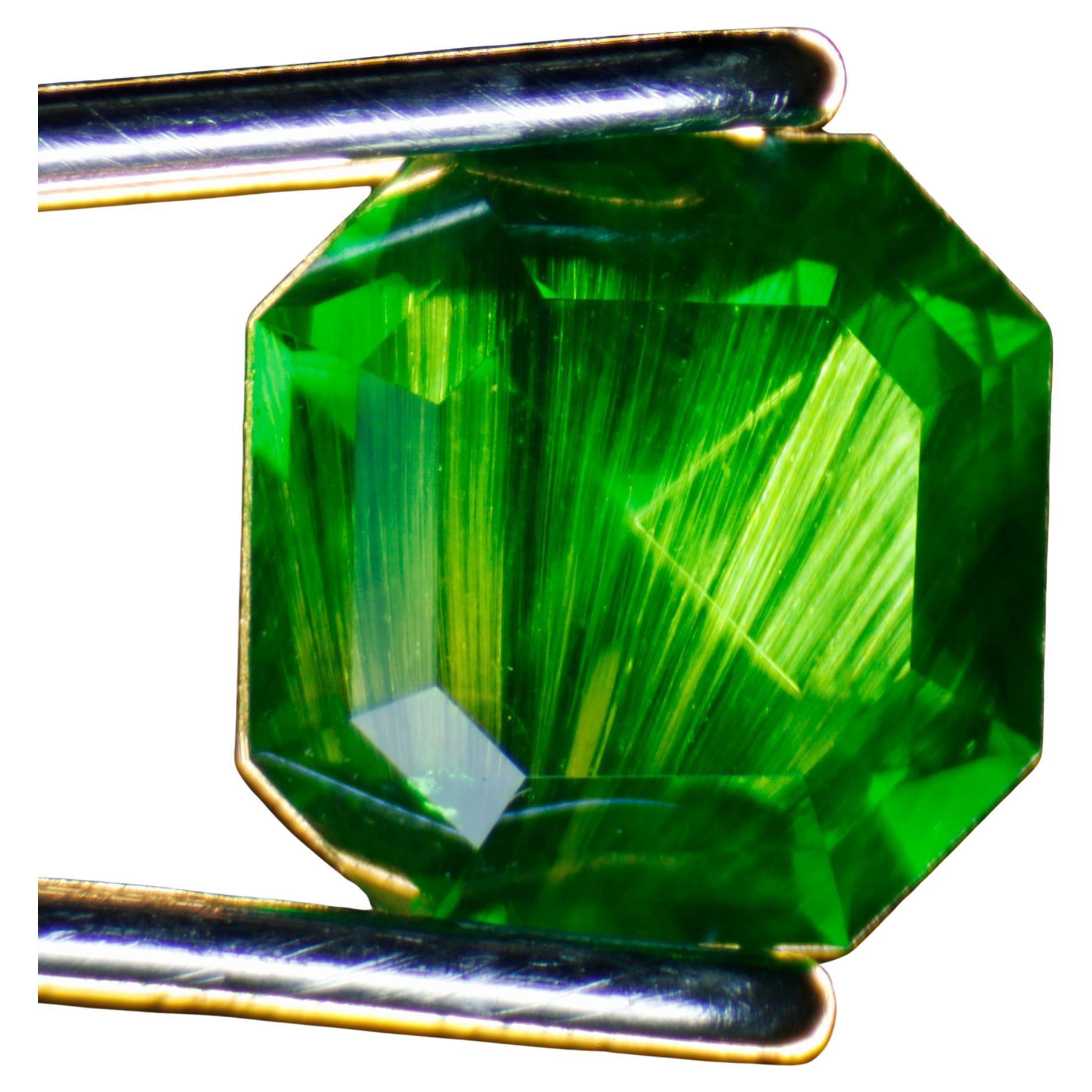 0.65 ct Intense Horsetail Inclusion Square Cut Demantoid Garnet from Russia For Sale