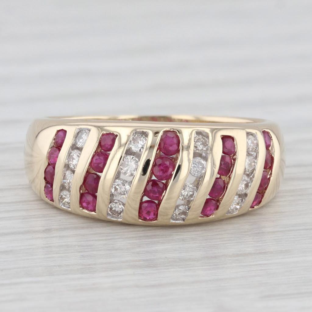 0.65 ctw Diamond Ruby Channel Set 14K Yellow Gold Size 7.5 Ring In Good Condition For Sale In McLeansville, NC