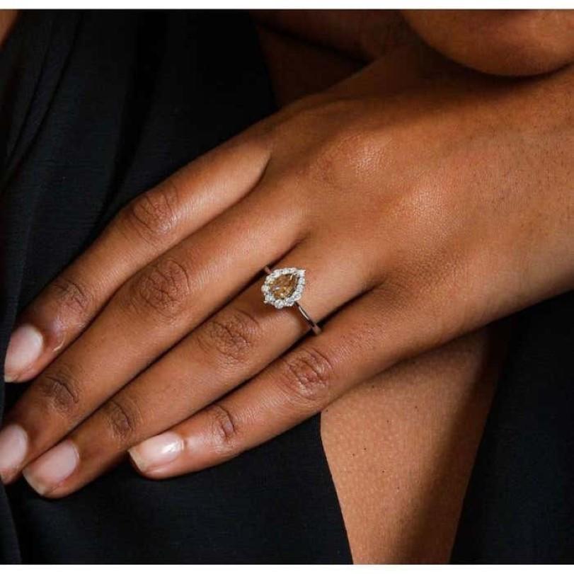 Round Cut 0.65ct Fancy Orangish Yellow Diamond Ring For Sale