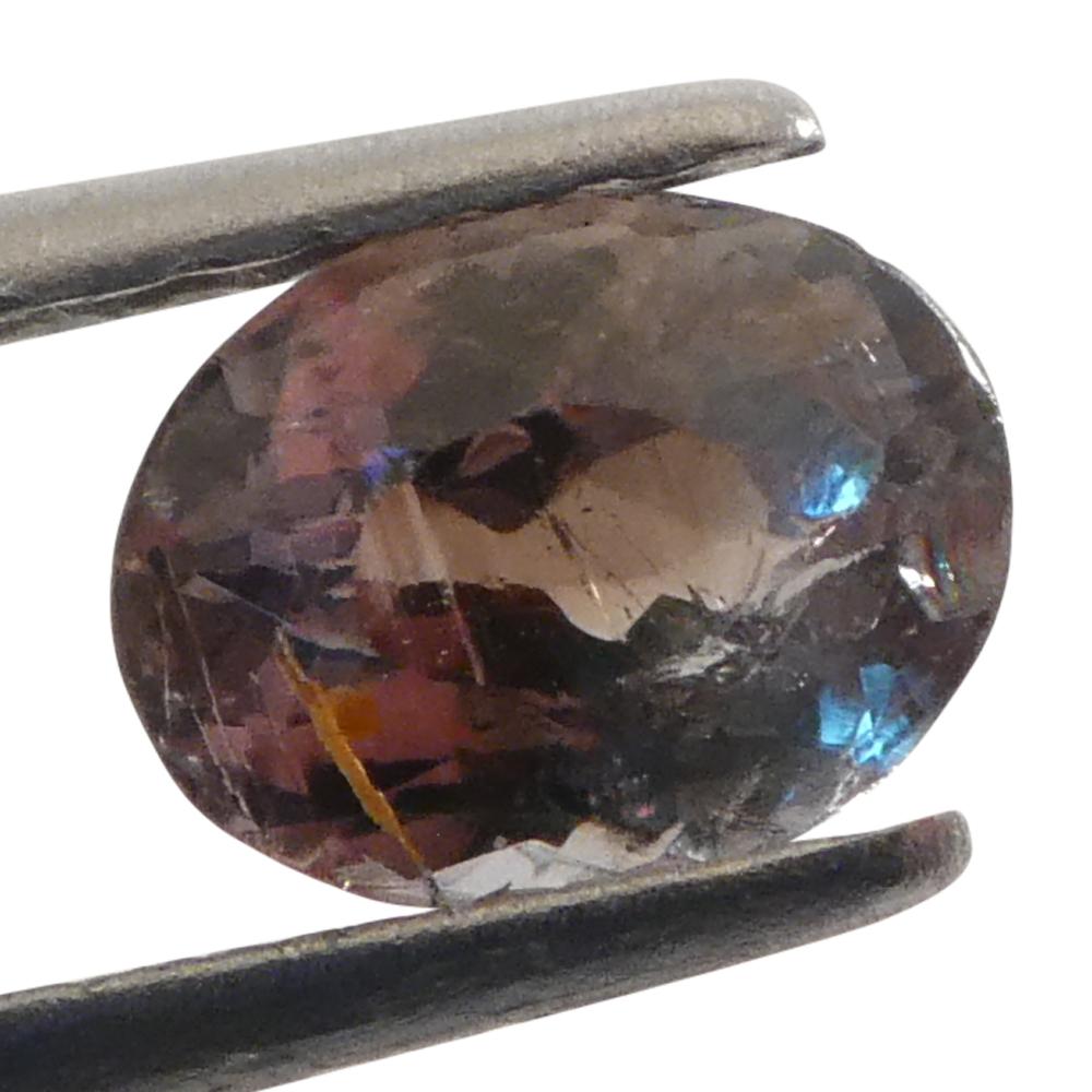 0.65ct Oval Greenish Yellow changing to Purple Alexandrite from Sri Lanka For Sale 6