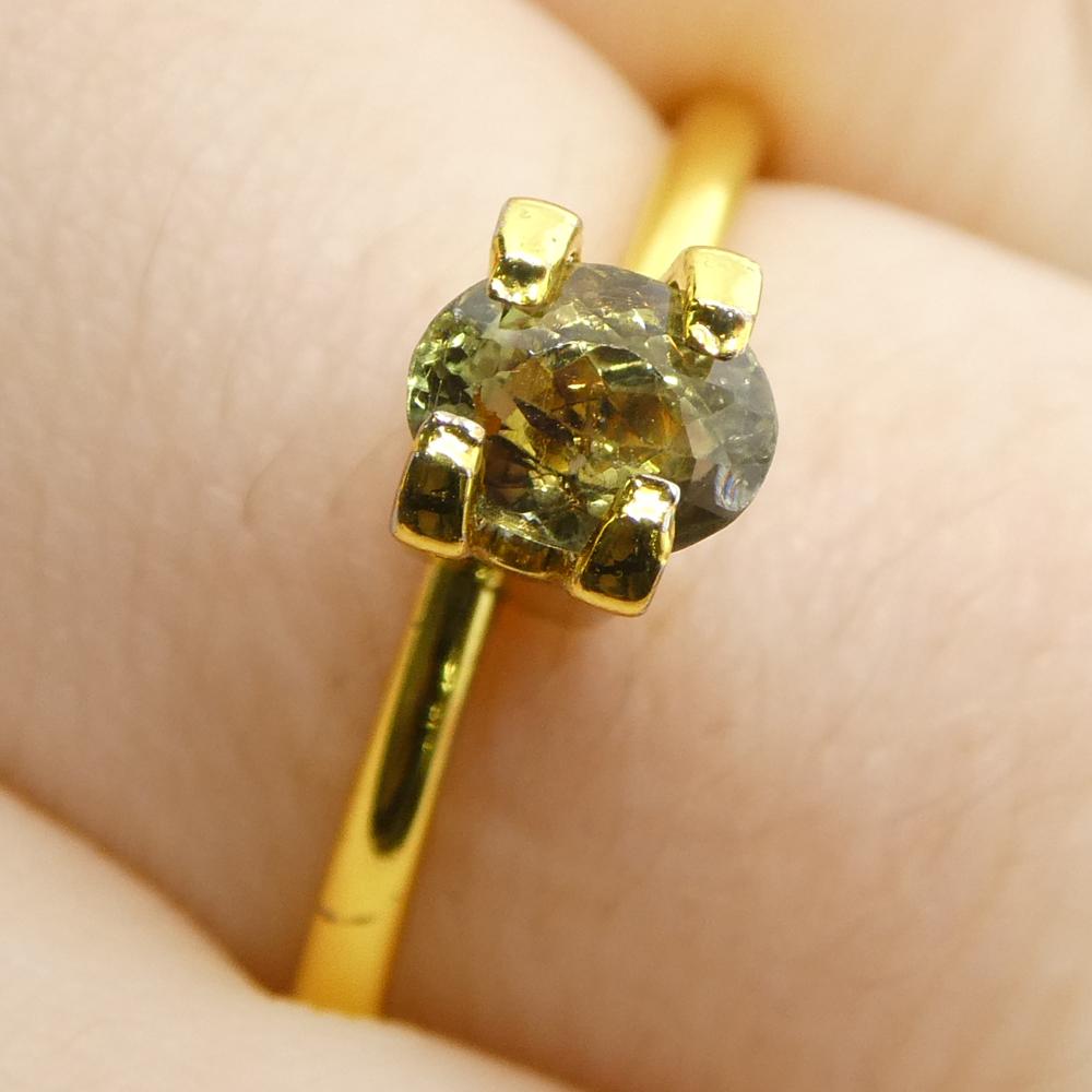 Brilliant Cut 0.65ct Oval Greenish Yellow changing to Purple Alexandrite from Sri Lanka For Sale