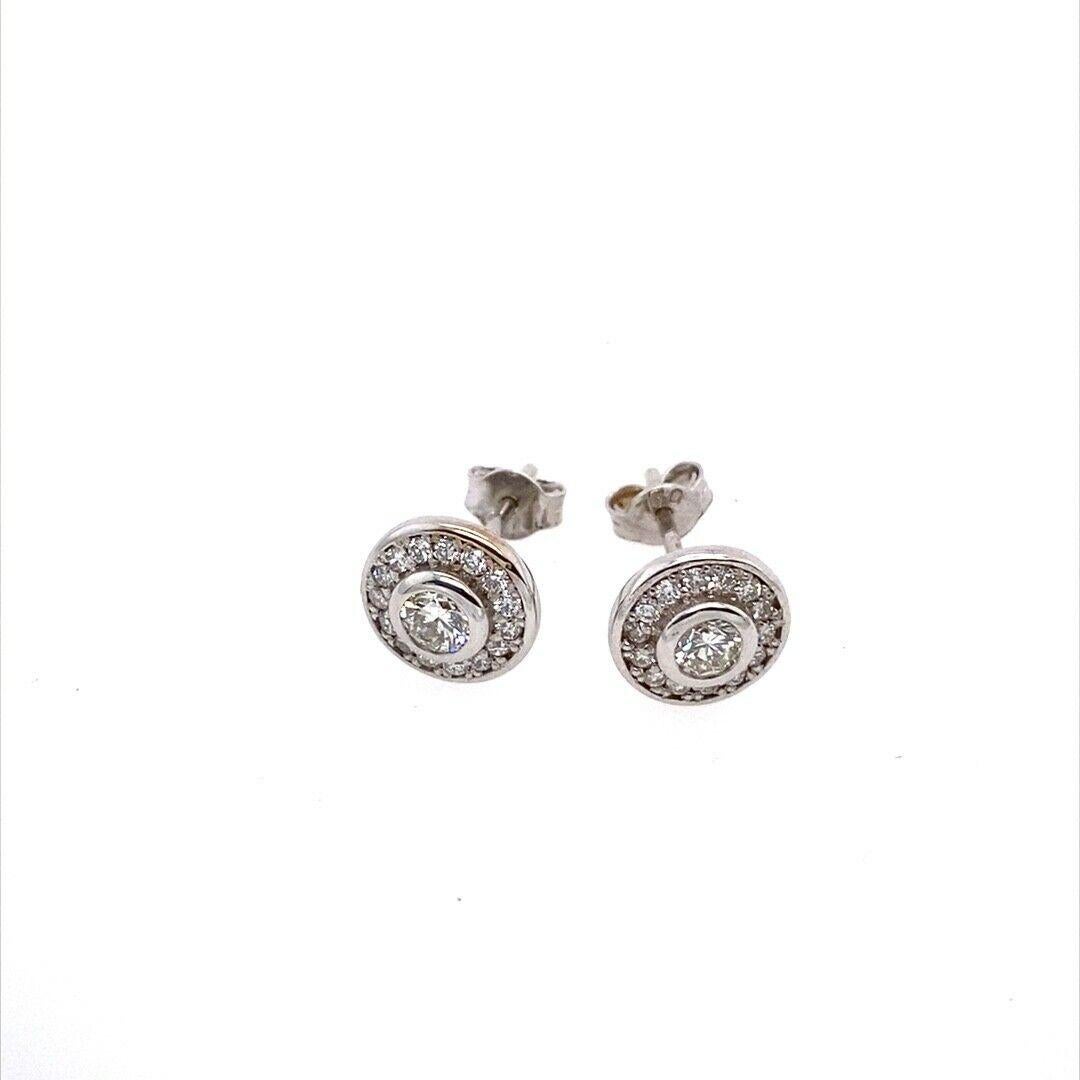 18ct White Gold Halo Earring Set With 0.65ct of Round Brilliant Cut Diamonds

The pair features a total of 0.65ct of round diamonds set in a halo design, in 18ct white gold. The halo setting is a classic design and is a timeless trend that goes well
