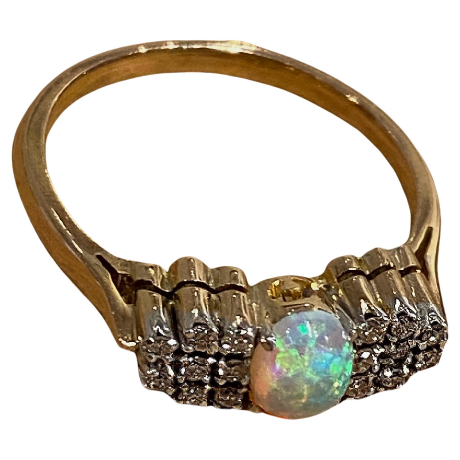 0.65ct Solid Australian Crystal Opal & 0.50ct Round Diamond Ring in 9K Gold. For Sale