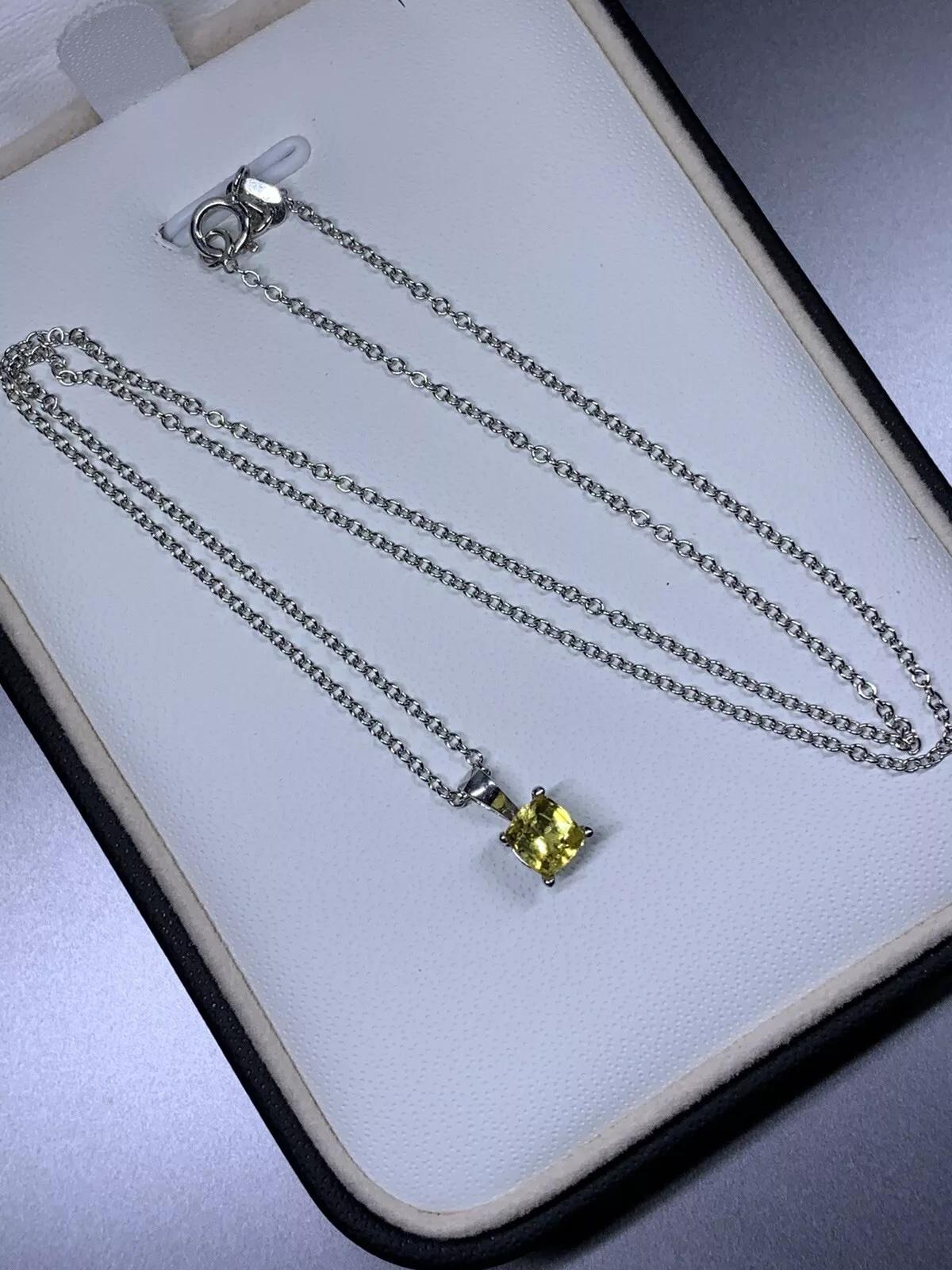 Pendentif saphir jaune 0,65 carat en or blanc 18 carats. Unisexe en vente
