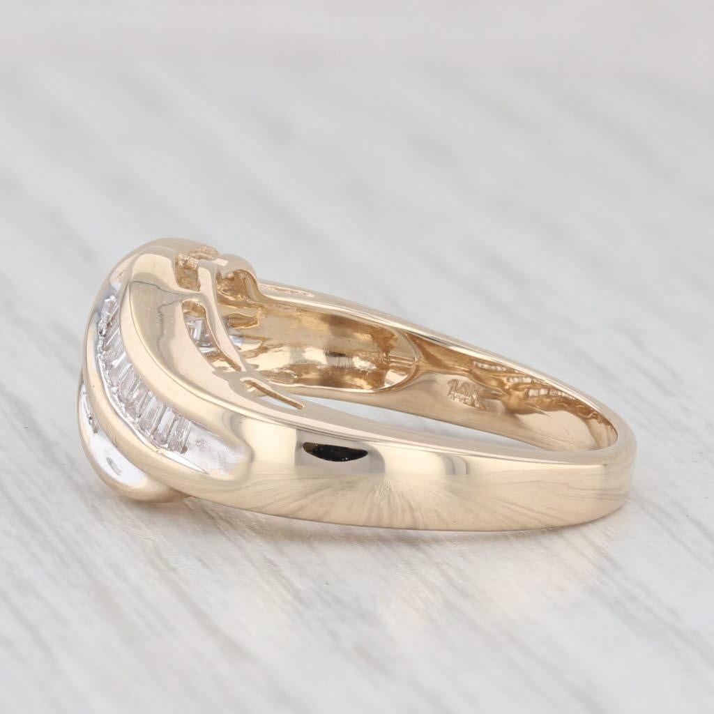 Anello bypass con baguette da 0,65 carati in oro giallo 14k, misura 7,25 In condizioni buone in vendita a McLeansville, NC