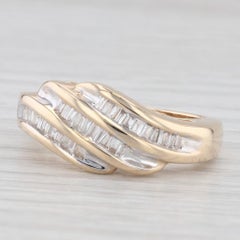 Anillo Bypass Baguette 0.65ctw Oro Amarillo 14k Talla 7.25