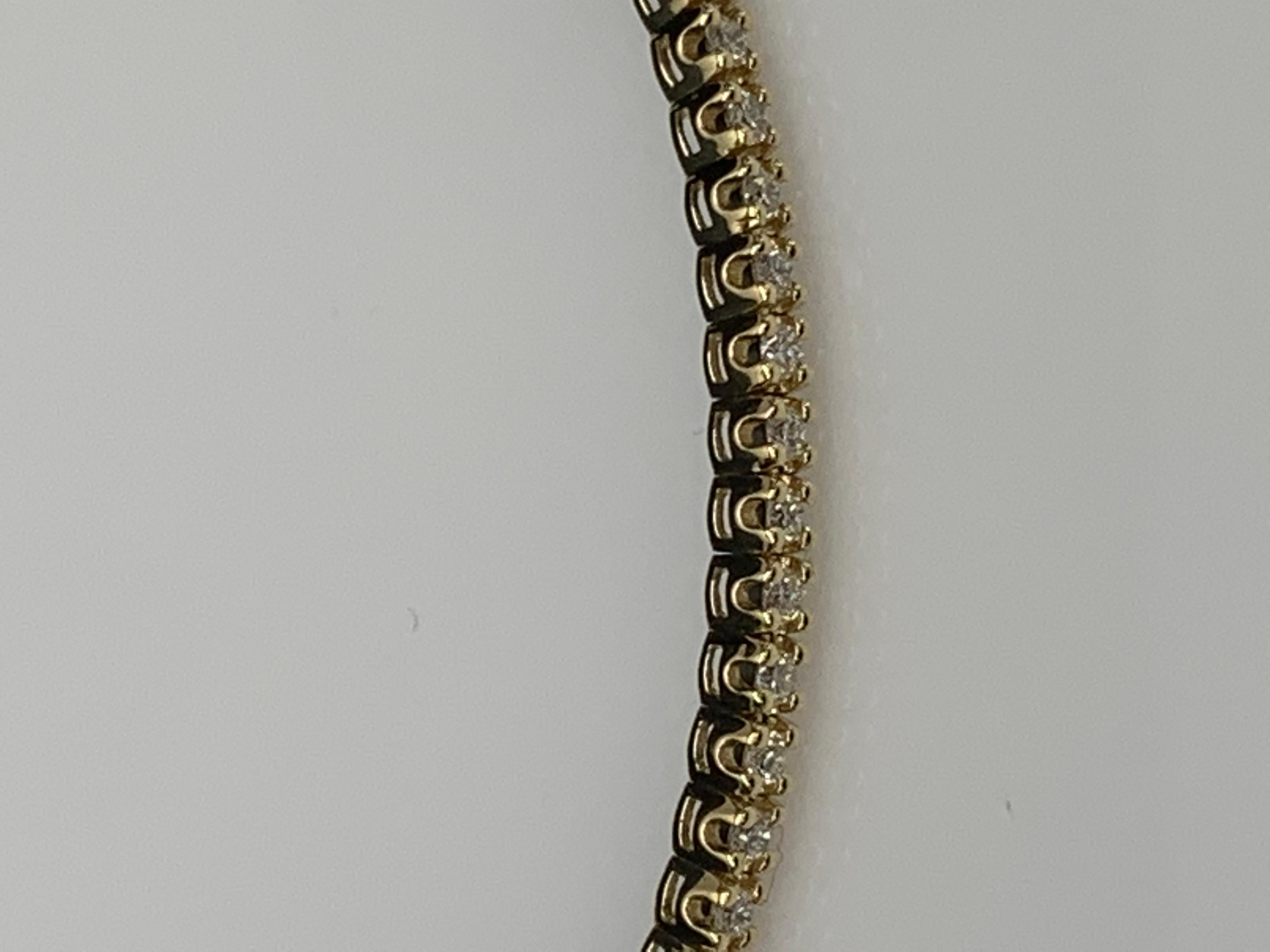 Modern 0.66 Carat Brilliant Round Cut Diamond Yellow Gold Bangle Bracelet in 14K For Sale
