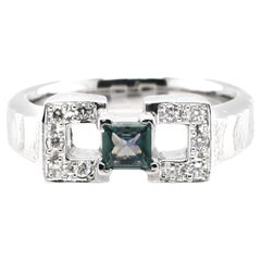 Used 0.66 Carat Color-Changing Alexandrite and Diamond Ring set in Platinum