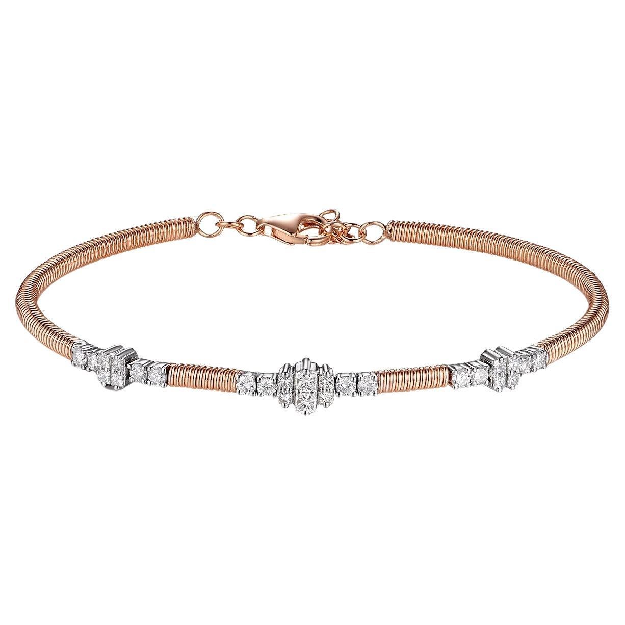 The 0.66 Carat Diamond Bangle Bracelet in 18K White and Rose Gold is a stunning piece of jewelry that seamlessly blends elegance and modern sophistication. This bracelet features a captivating combination of princess cut and round diamonds set in a