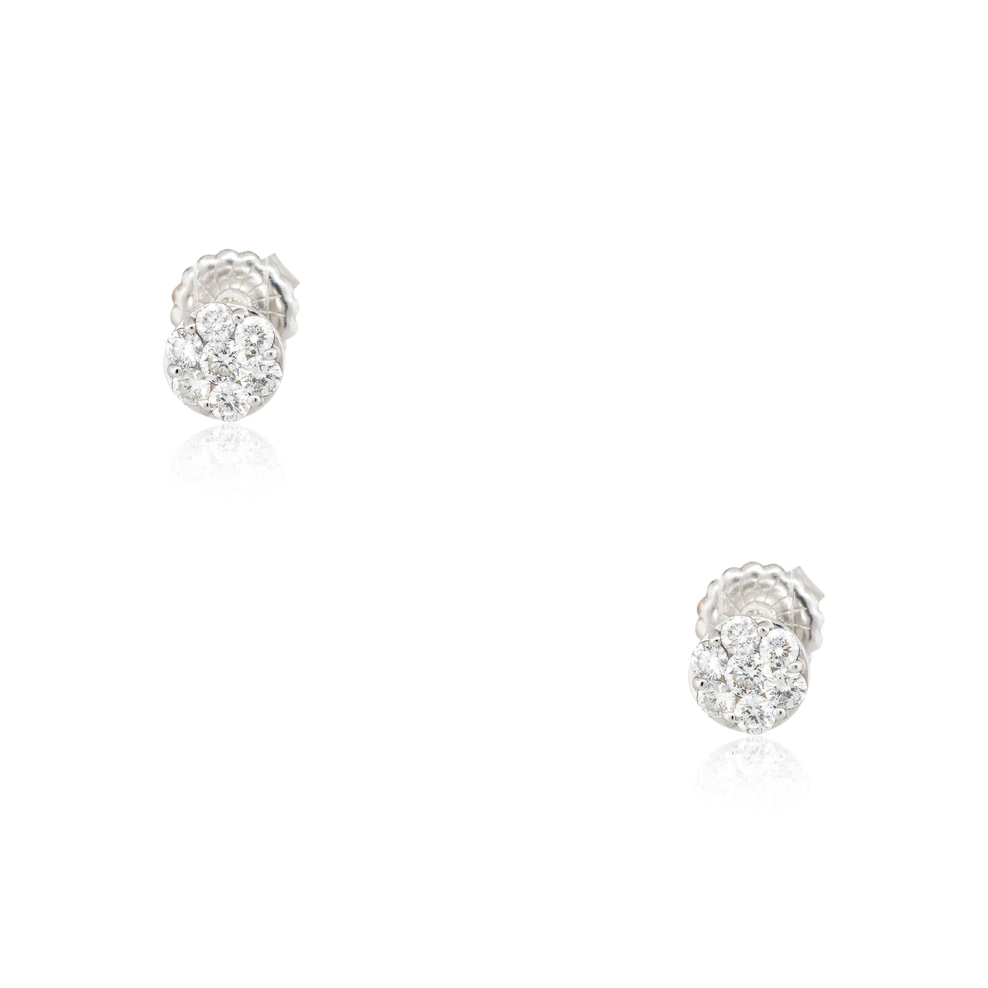 14k White Gold 0.66ctw Round Brilliant Diamond Cluster Stud Earrings
Material: 14k White Gold
Diamond Details: Diamonds are approximately 0.66ctw of Round Brilliant Diamonds. There are 7 large round brilliant diamonds in each earring (14 stones