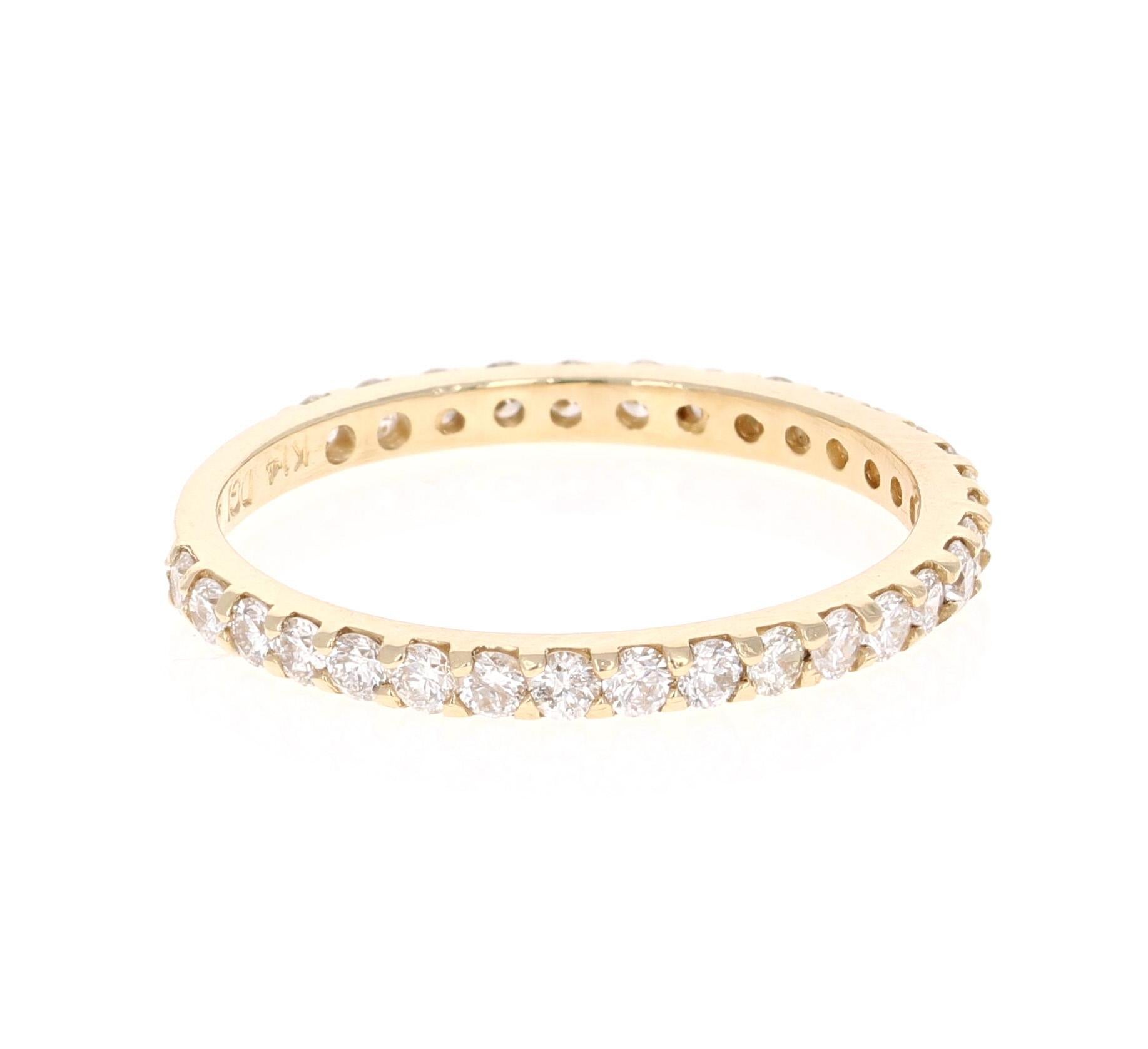 A beautiful band that can be worn as a single band or stack with other bands in other colors of Gold! 

This ring has 30 Round Cut Diamonds that weigh 0.66 Carats. The clarity and color of the diamonds are SI-F.

Crafted in 14 Karat Yellow Gold and