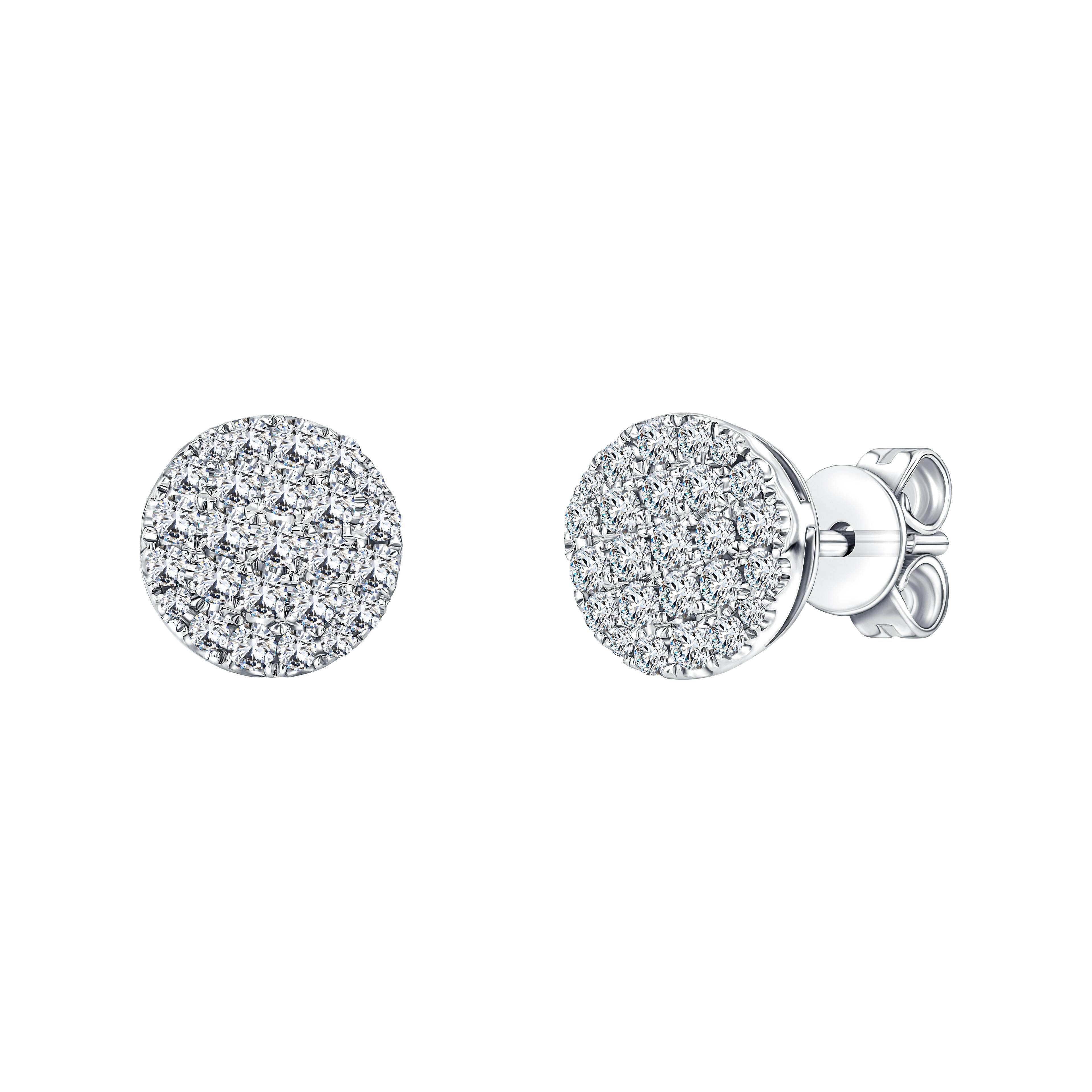 Questi squisiti orecchini a grappolo di diamanti rotondi da 0,66 carati Colore Bianco H Chiarezza SI1. Incastonati in oro bianco 18 carati, questi splendidi e versatili orecchini con diamante saranno un regalo indimenticabile. Con marchio