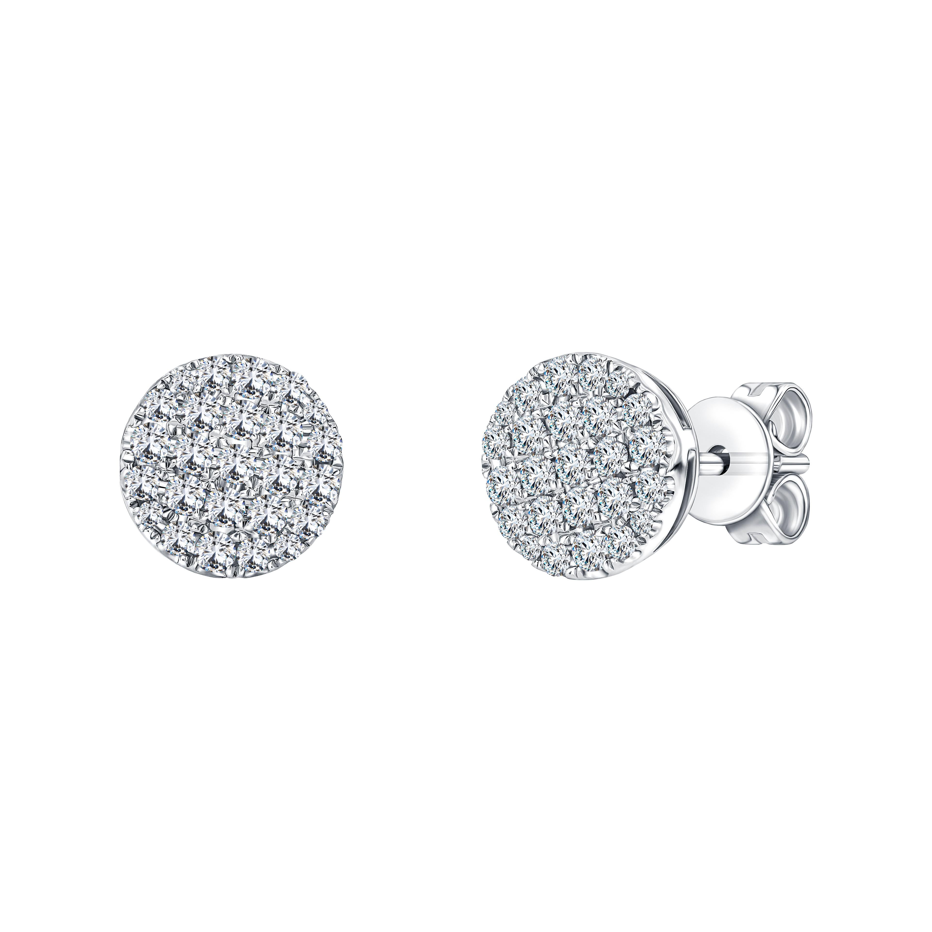 Ces exquis clous d'oreilles en forme de grappe de diamants ronds de 0,66 carat sont de couleur blanche H et de clarté SI1. Montées en or blanc 18 carats, ces superbes boucles d'oreilles diamantées polyvalentes feront un cadeau inoubliable. Poinçon