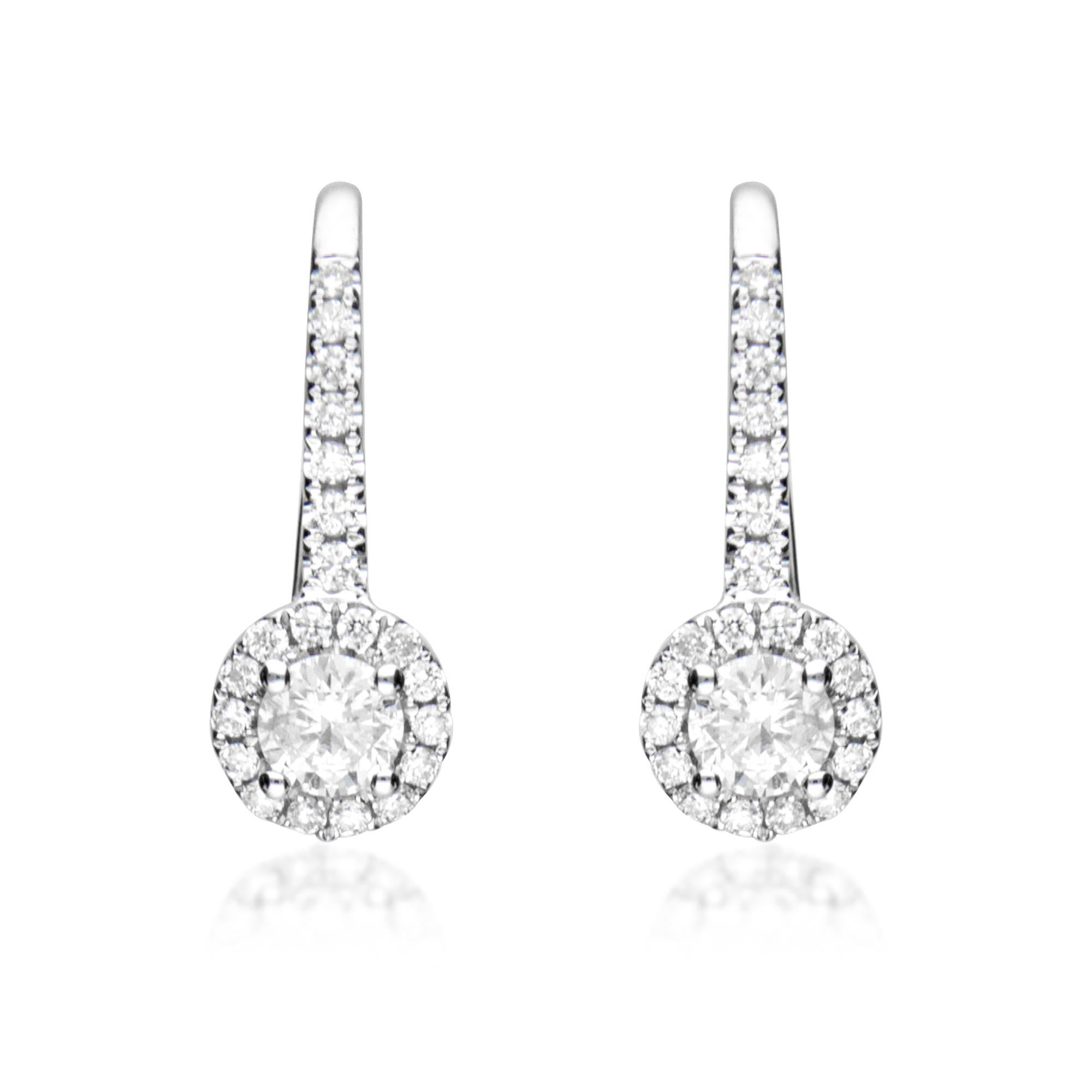 This beautiful Earring is crafted in 14-karat White gold and features 2 Pcs White Round diamonds 0.38 carat  surrounded with 66 Pcs White Round diamonds 0.28 carat in GH-SI quality. 
Crafted from 14 karat White gold these earrings come with high