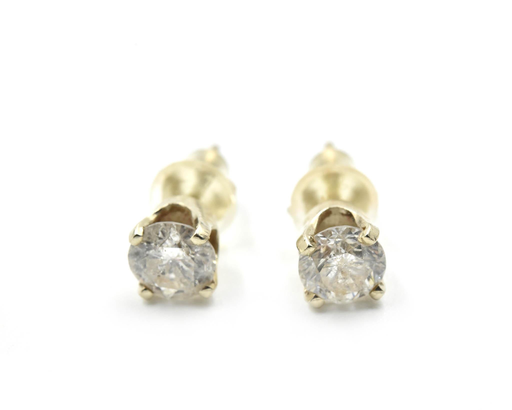 Round Cut 0.66 Carat Round Brilliant Diamond Stud Earrings 14 Karat Yellow Gold For Sale