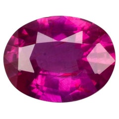 0,66 ct, rubis ovale non traité, d'un rouge-rose vif