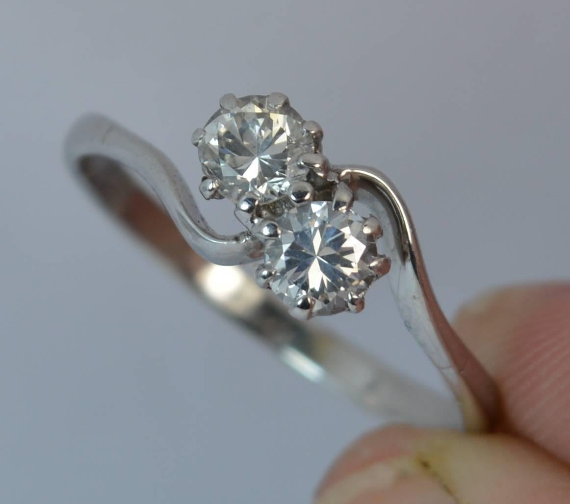 Round Cut Diamond 18 Carat White Gold Toi Et Moi Twist Two-Stone Ring