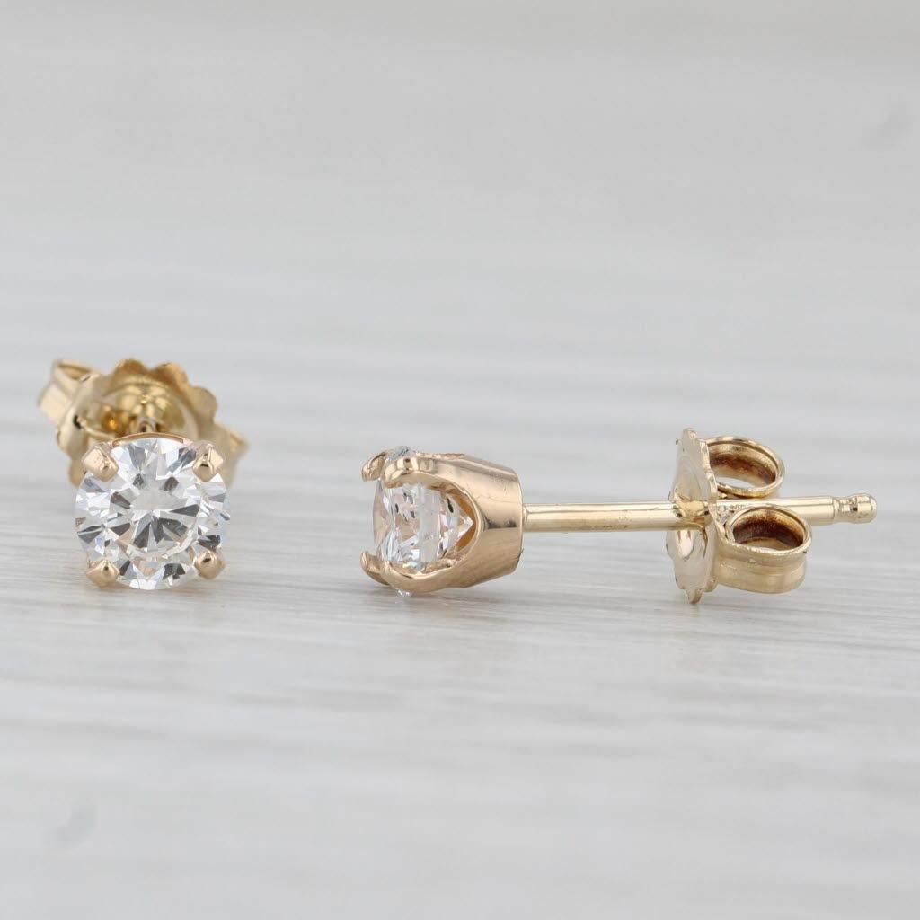 Round Cut 0.66ctw Round Solitaire Diamond Stud Earrings 14k Yellow Gold