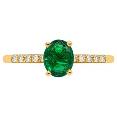 0.67 Carat Emerald and Diamond 18 Carat Yellow Gold Engagement Ring