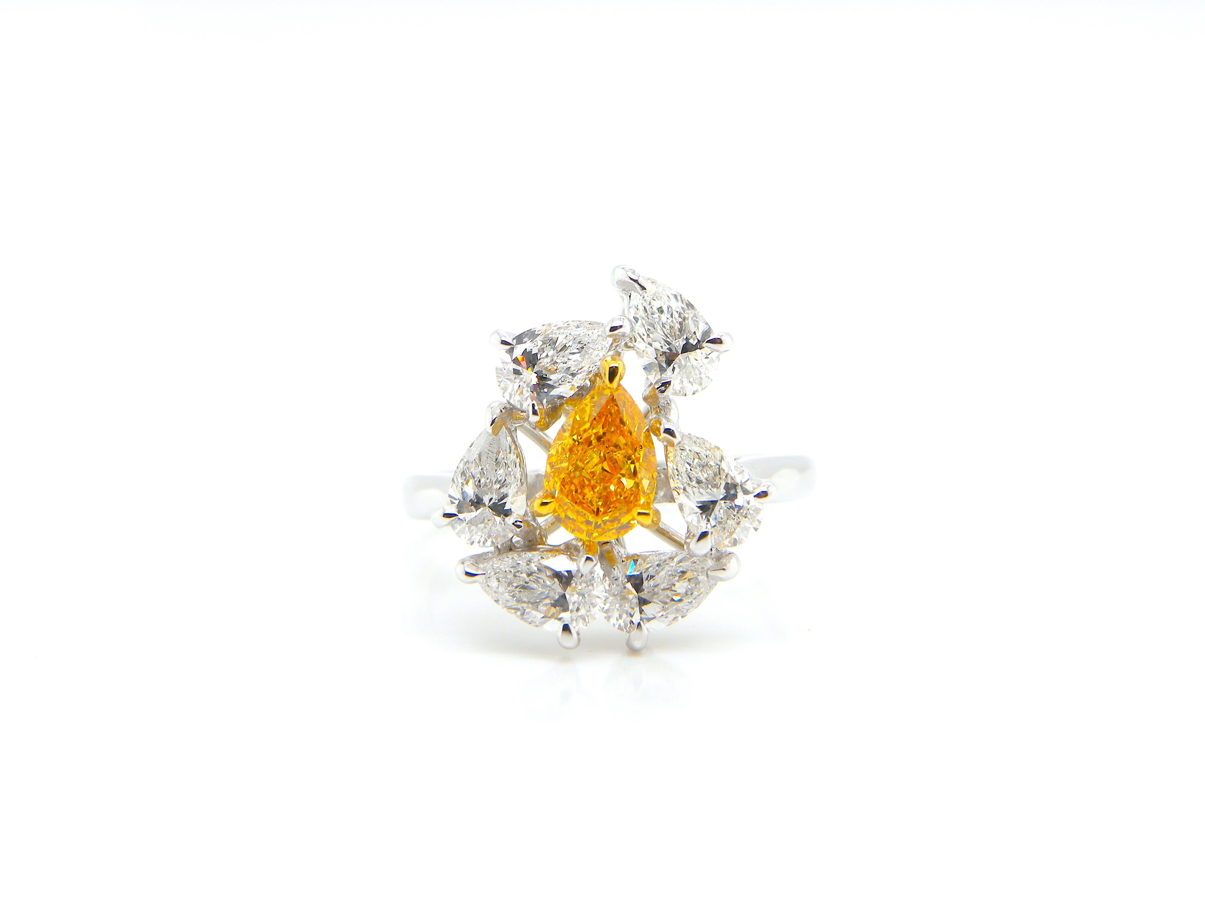 Contemporary 0.67 Carat GIA Certified Fancy Vivid Yellow-Orange Diamond and Diamond Ring