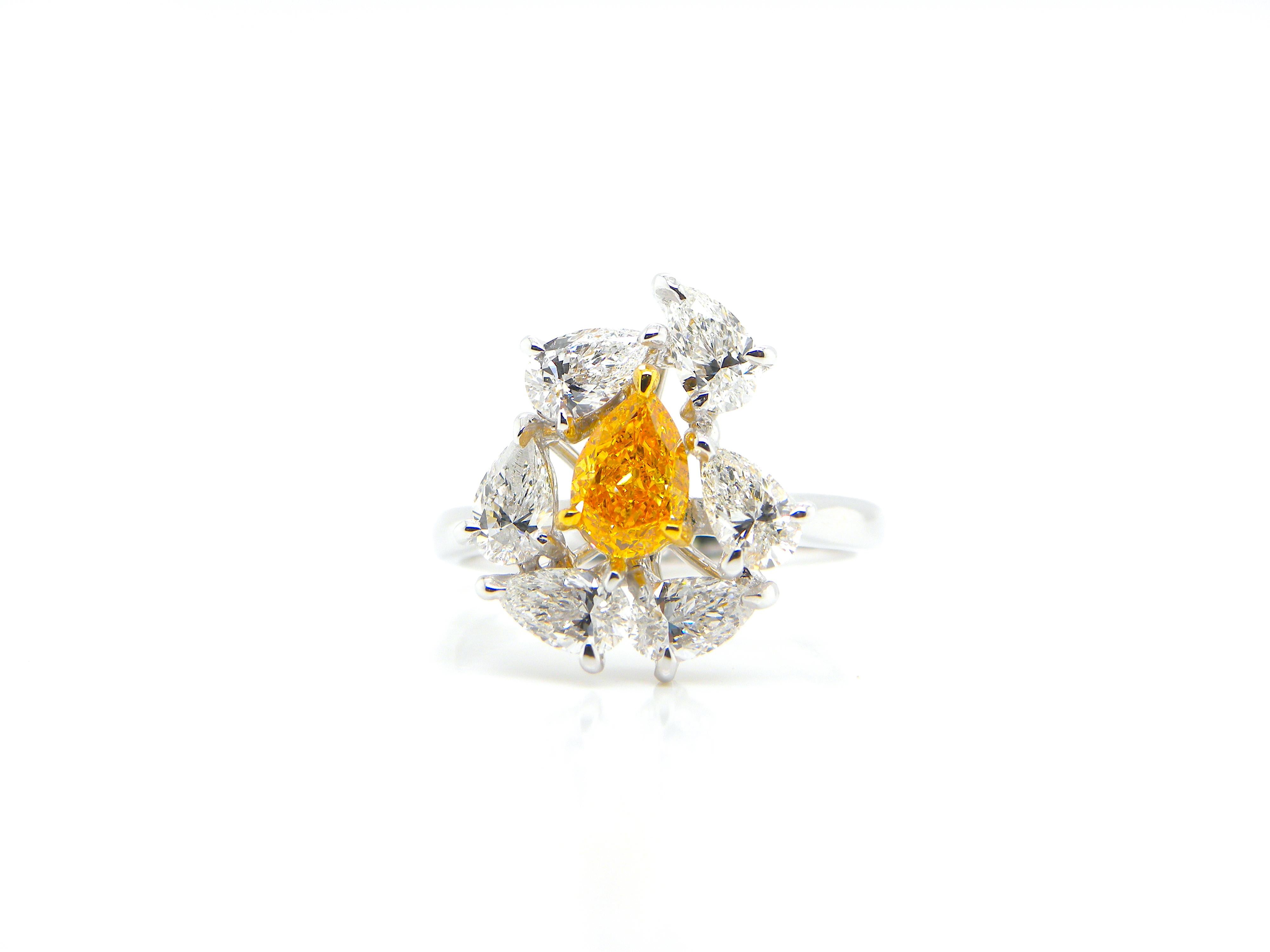 Pear Cut 0.67 Carat GIA Certified Fancy Vivid Yellow-Orange Diamond and Diamond Ring