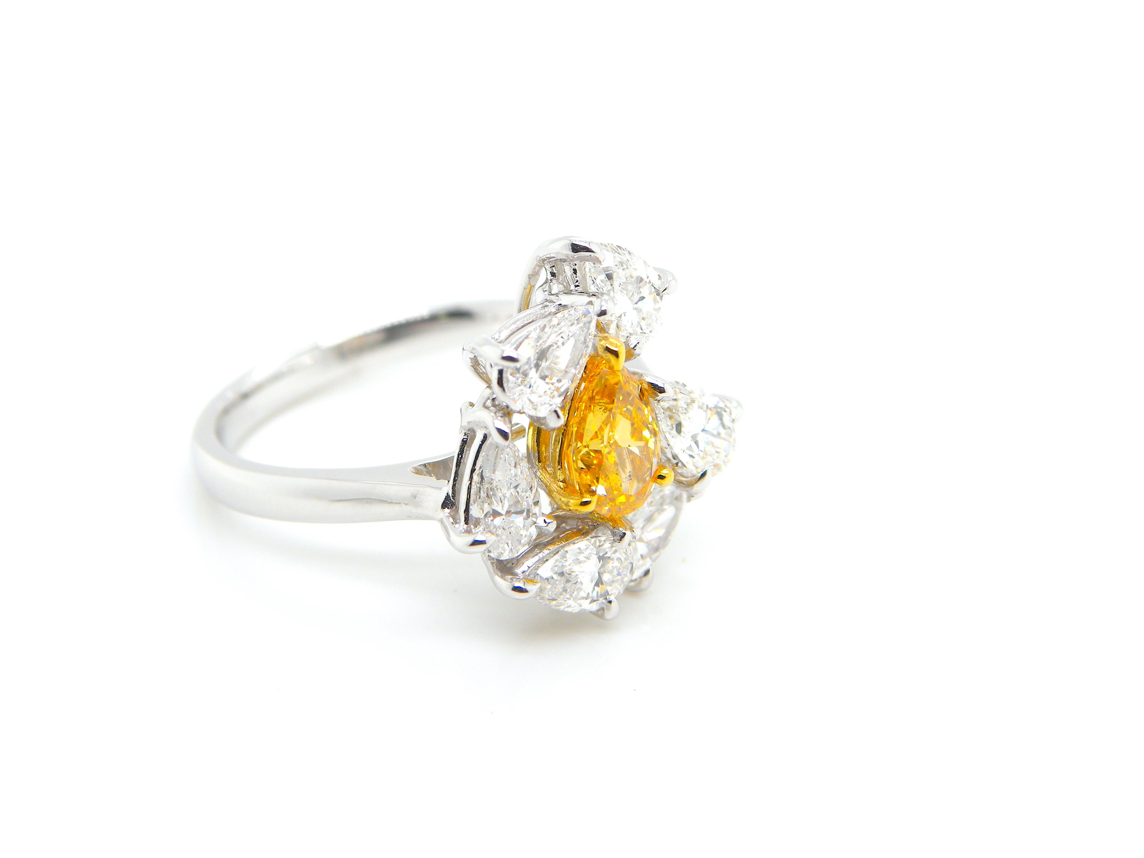 0.67 Carat GIA Certified Fancy Vivid Yellow-Orange Diamond and Diamond Ring In New Condition In Hong Kong, HK