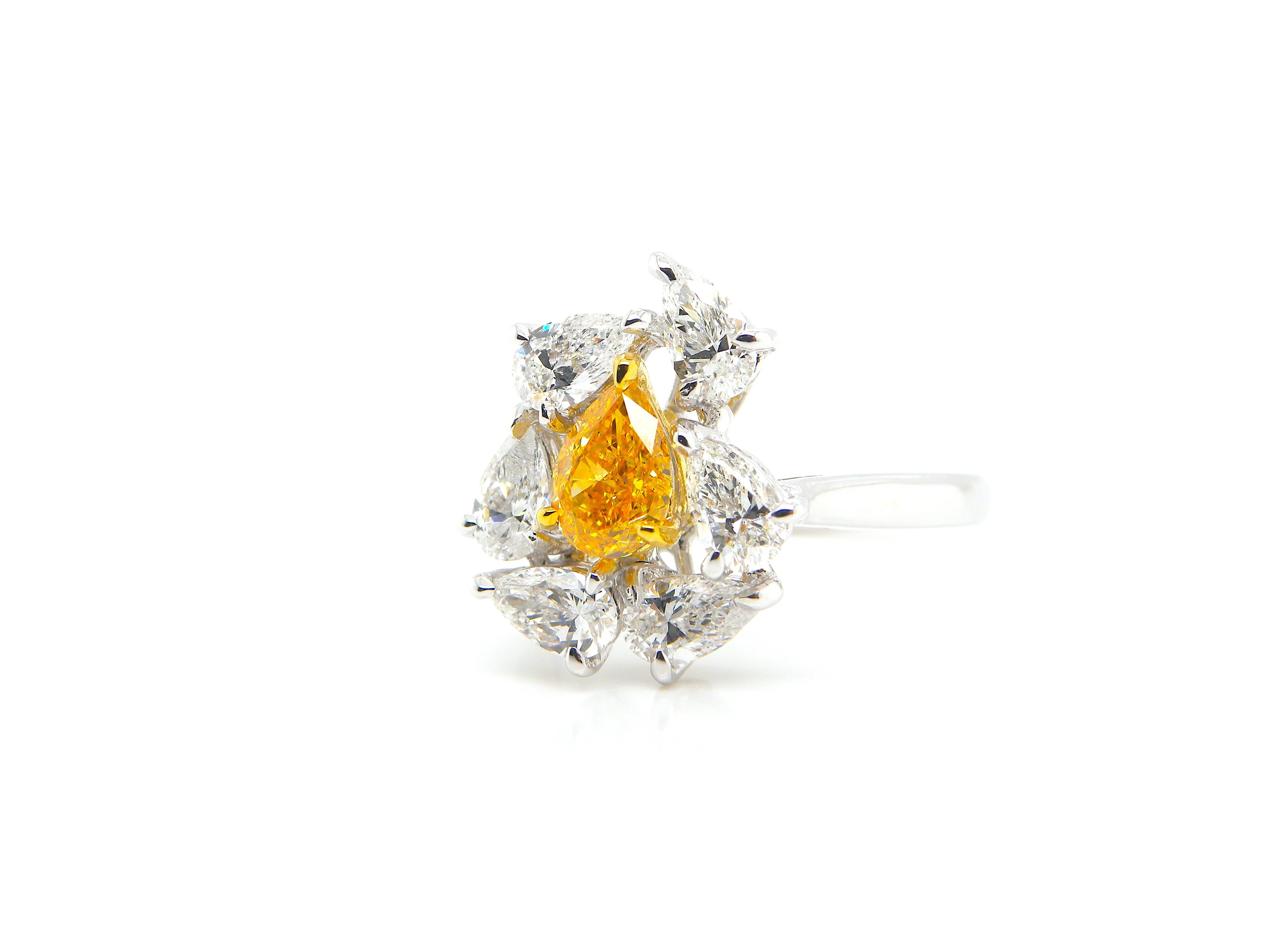 0.67 Carat GIA Certified Fancy Vivid Yellow-Orange Diamond and Diamond Ring 3