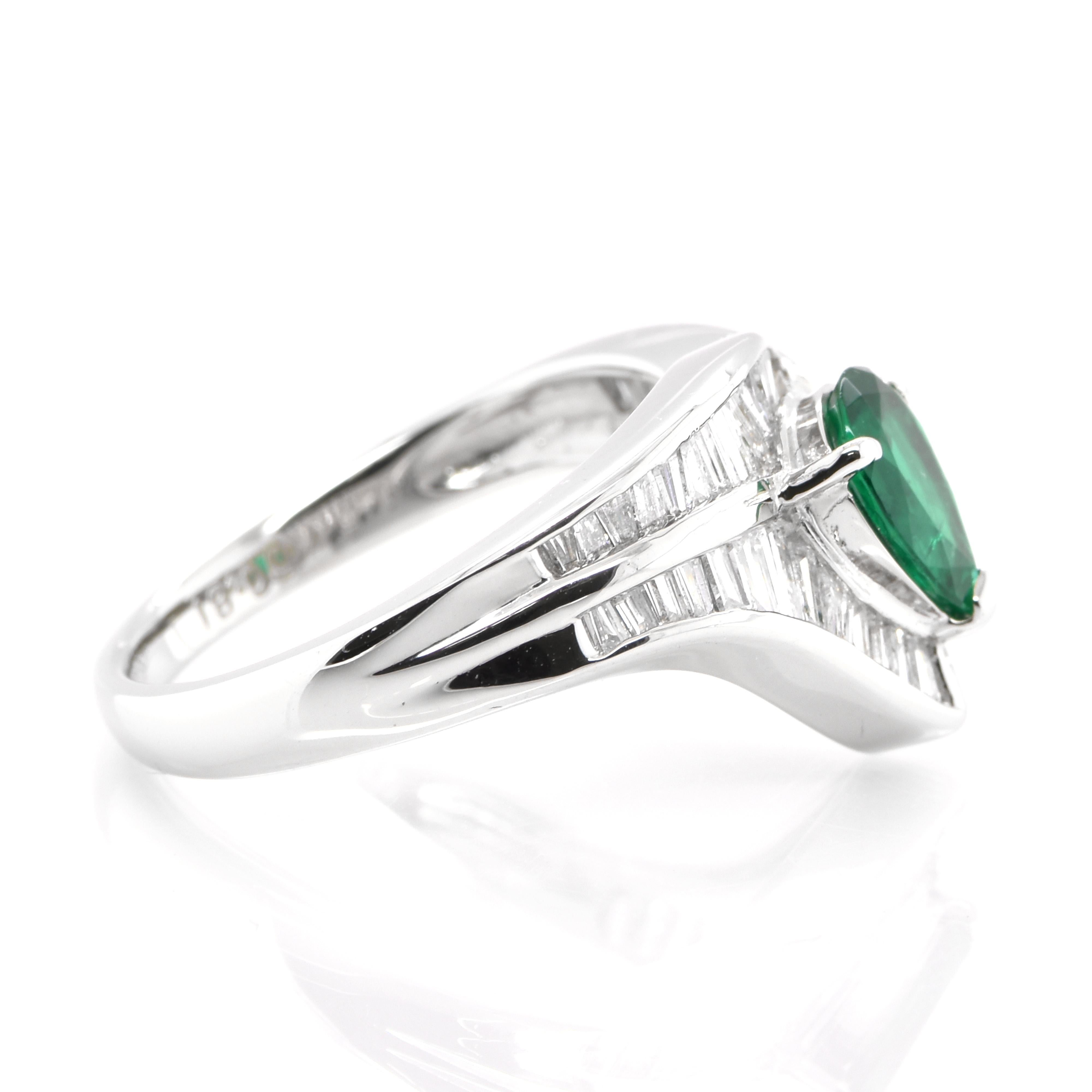 Women's 0.67 Carat Natural Pear Cut Emerald and Diamond-Baguette Ring Set in Platinum