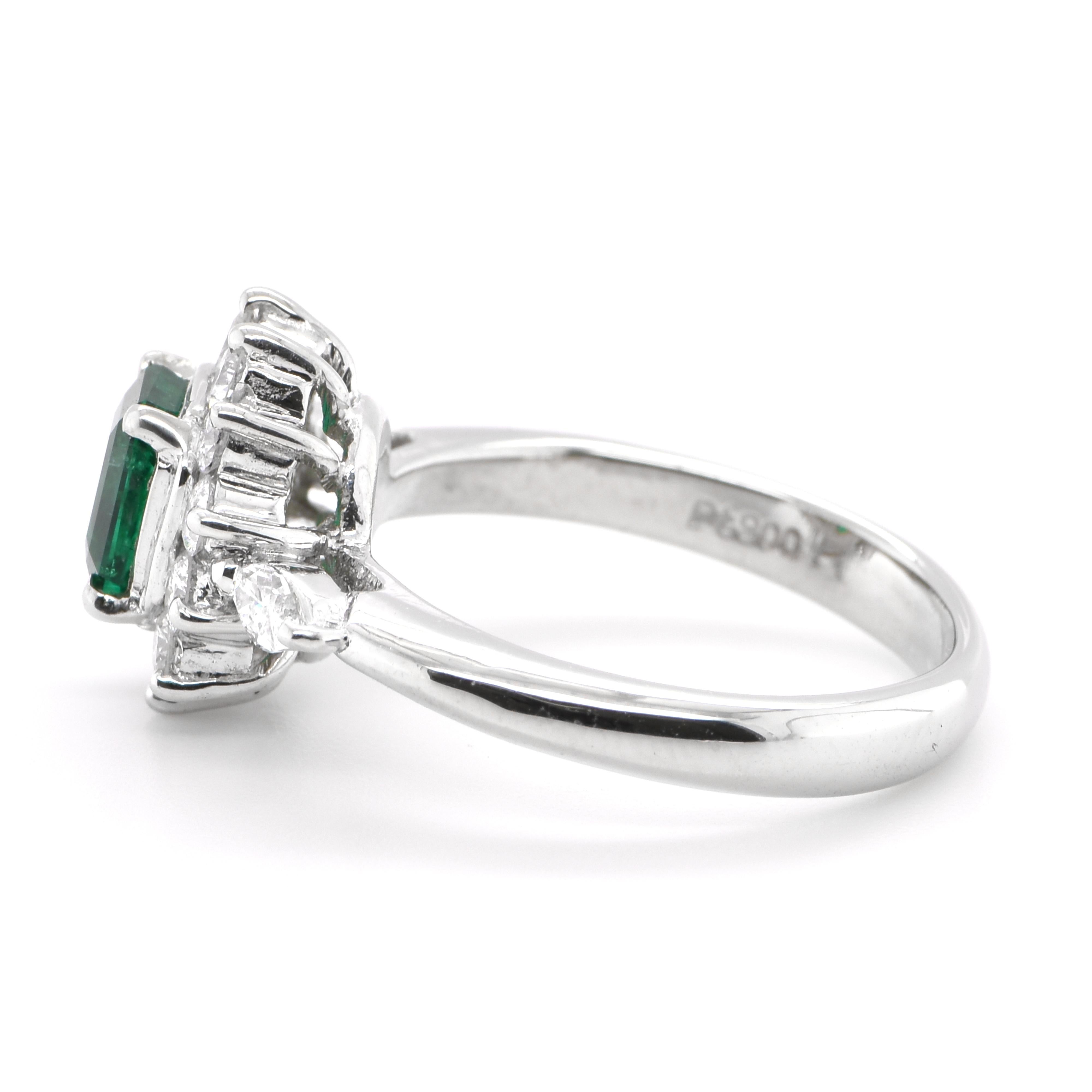 Emerald Cut 0.67 Carat Natural Emerald and Diamond Ring Set in Platinum