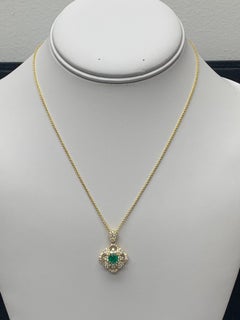 0.67 Carat Round Cut Emerald and Diamond Pendant Necklace in 18K Yellow Gold
