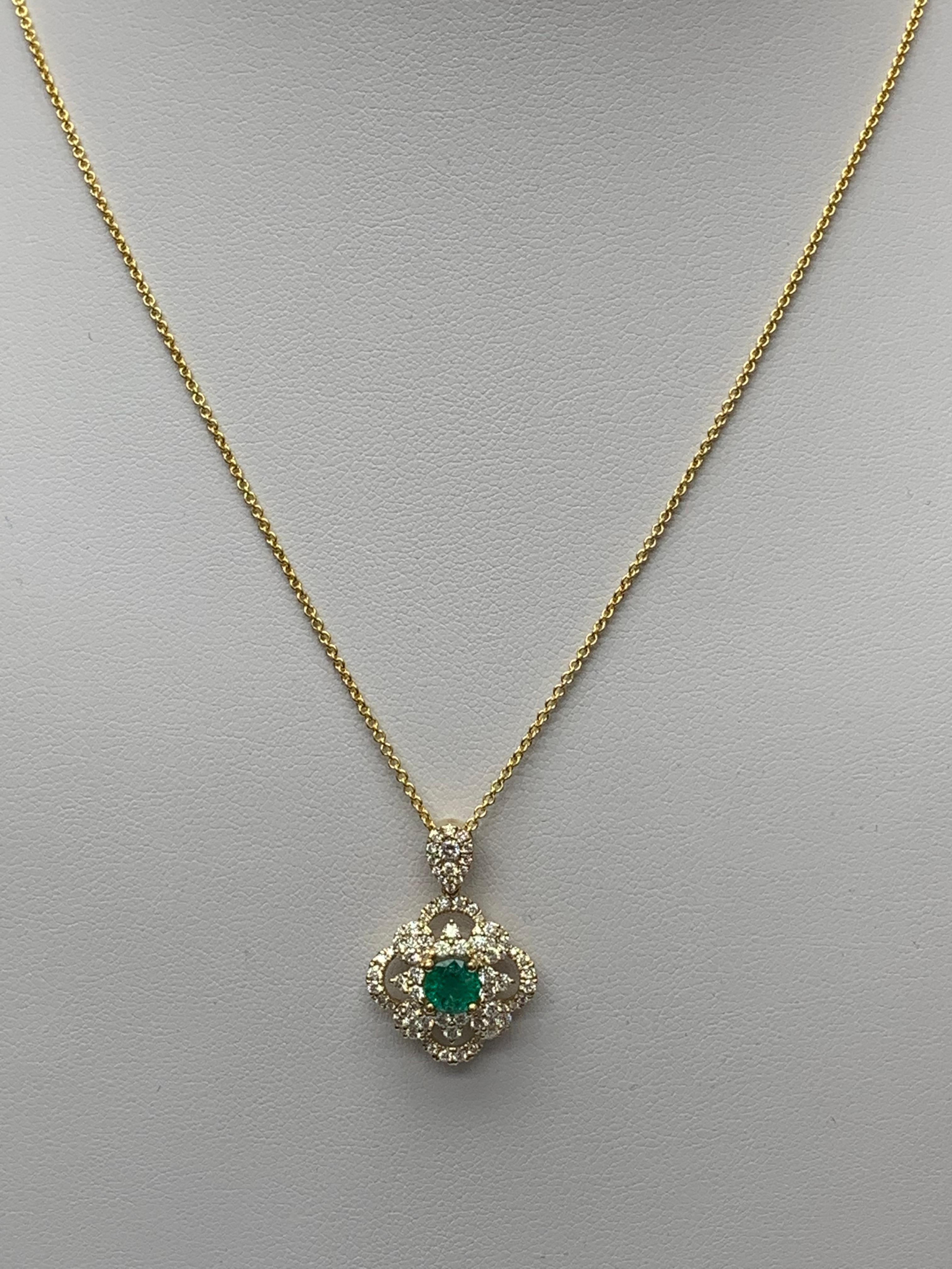 Modern 0.67 Carat Round Cut Emerald and Diamond Pendant Necklace in 18K Yellow Gold For Sale