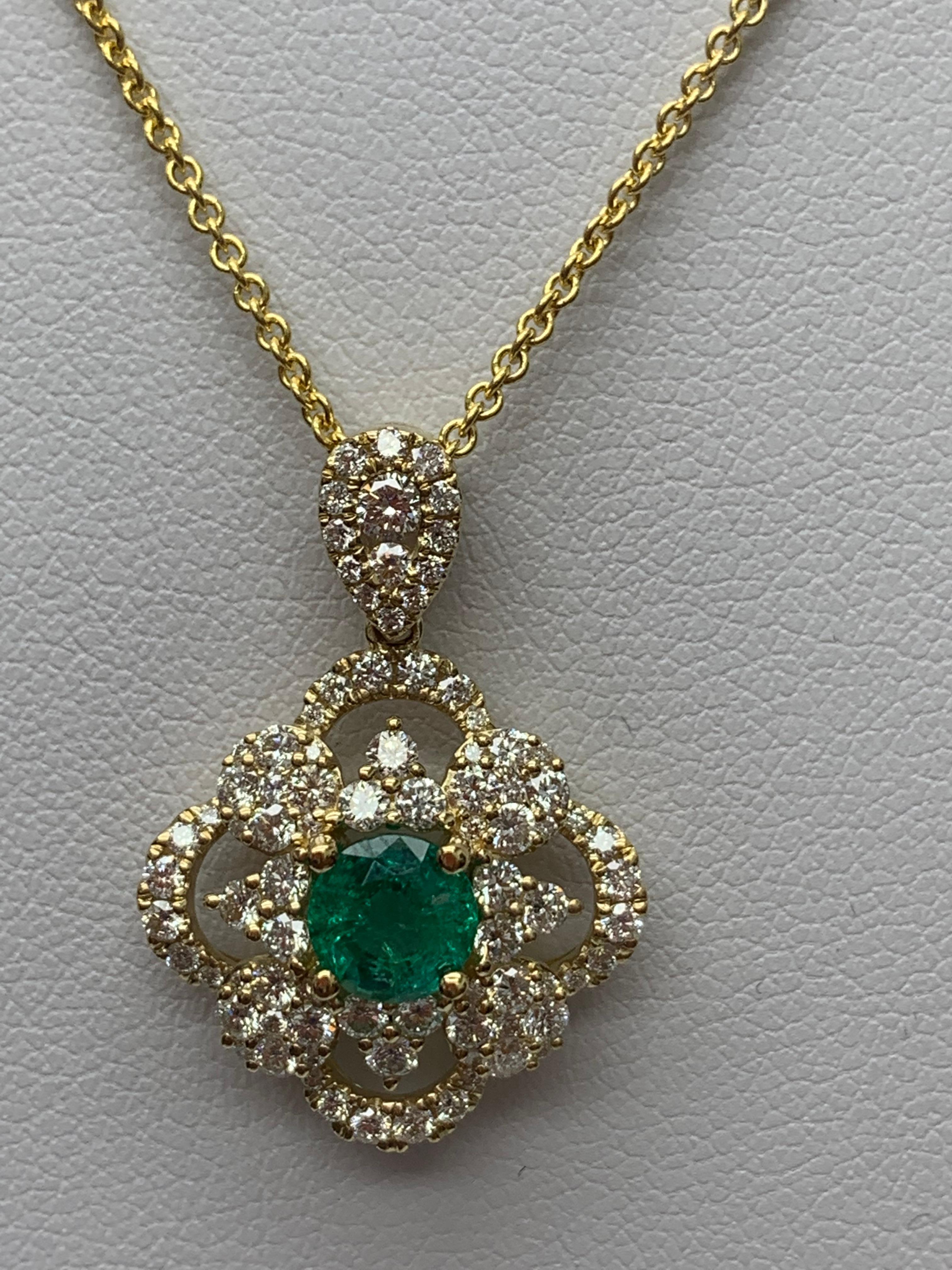 Women's 0.67 Carat Round Cut Emerald and Diamond Pendant Necklace in 18K Yellow Gold For Sale