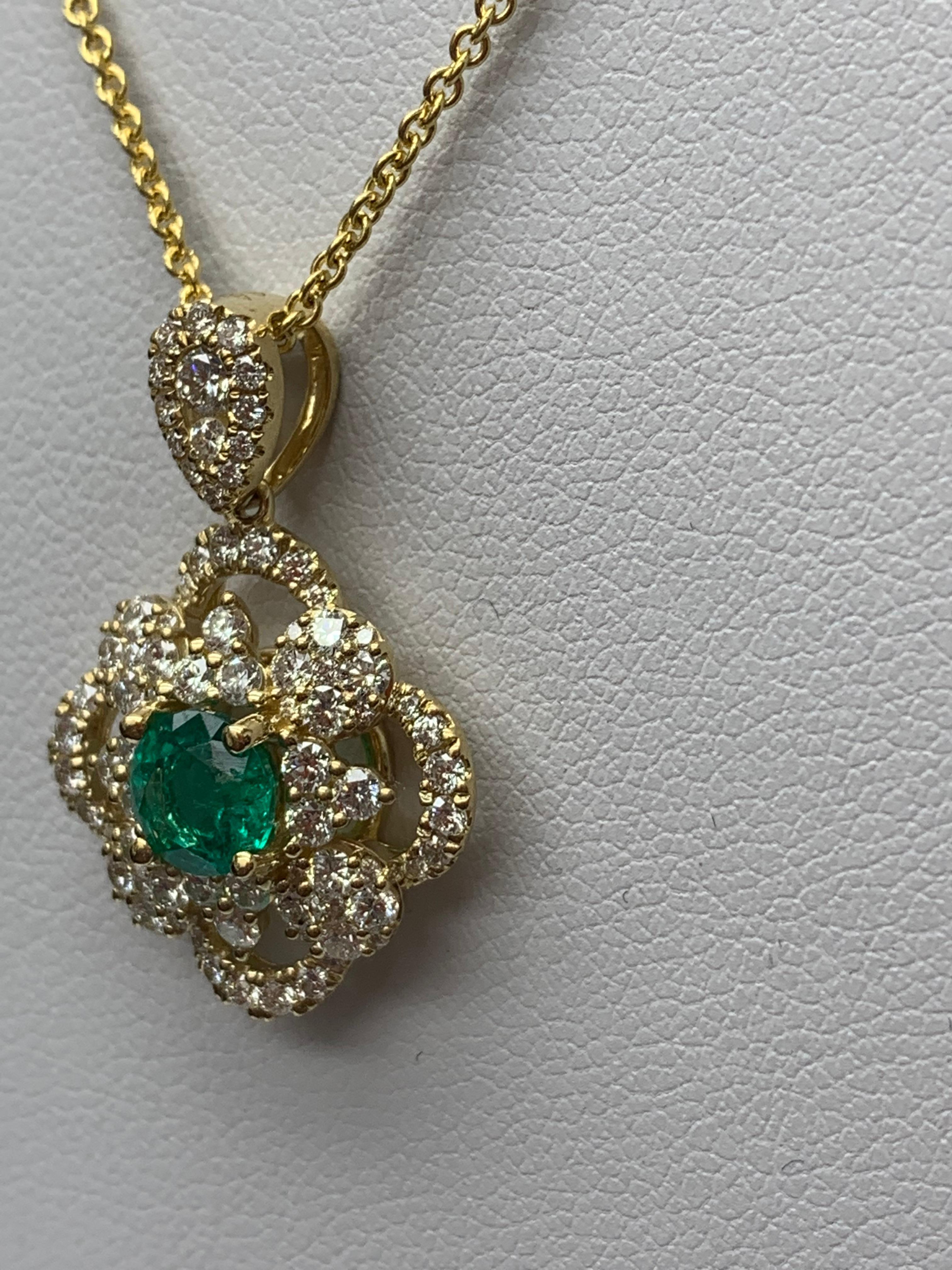 0.67 Carat Round Cut Emerald and Diamond Pendant Necklace in 18K Yellow Gold For Sale 1