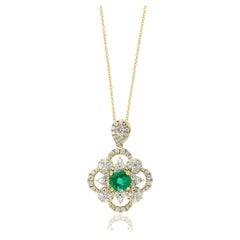 0,67 Karat Smaragd- und Diamant-Anhänger-Halskette aus 18 Karat Gelbgold mit Rundschliff