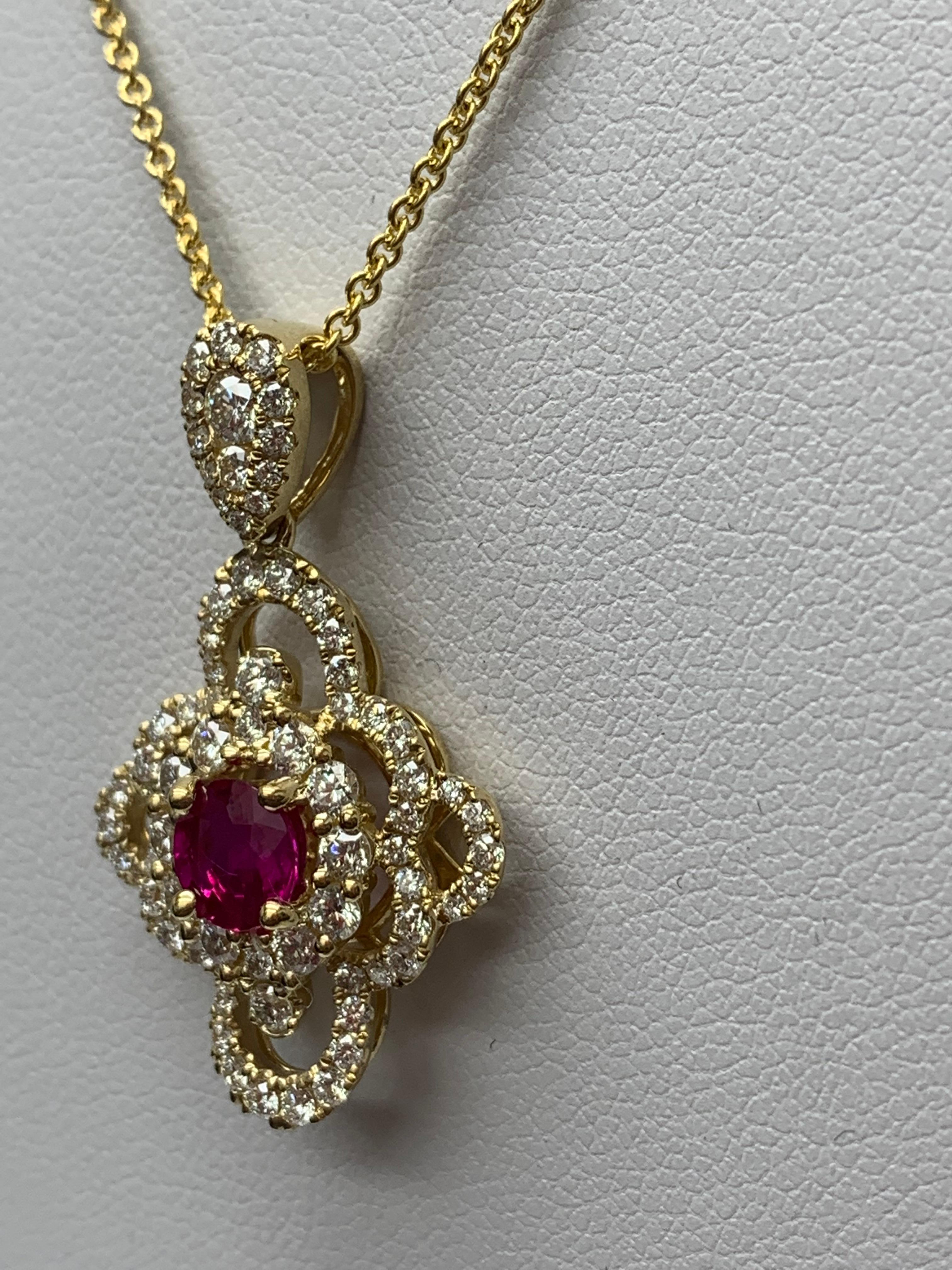 Women's 0.67 Carat Round Cut Ruby and Diamond Pendant Necklace in 18K Yellow Gold For Sale