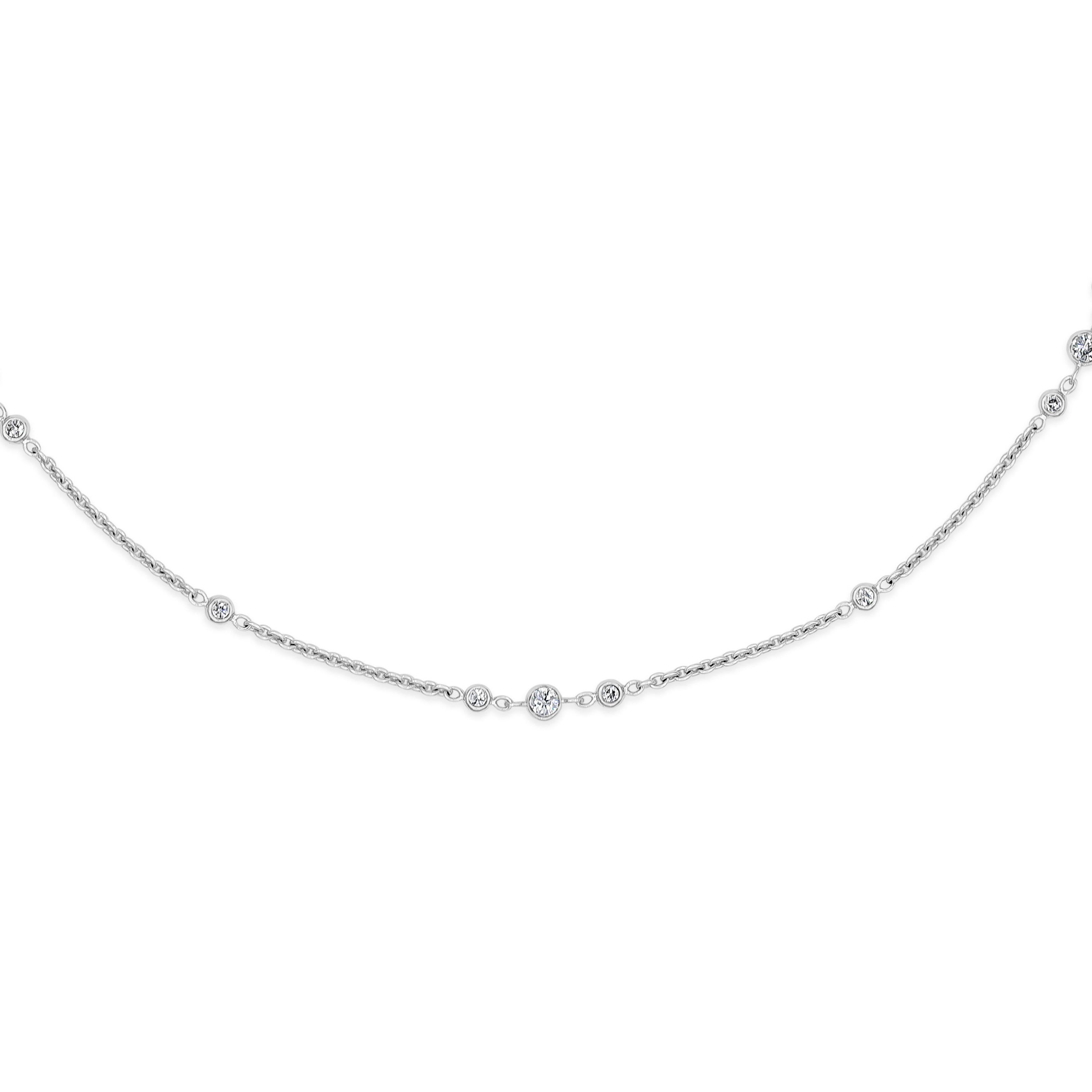 A classic and timeless piece showcasing and a thin 18 karat white gold chain, set with round brilliant diamonds in three-to one equal intervals. Diamonds weigh 0.67 carats total. 16 inches in length.

Roman Malakov is a custom house, specializing in