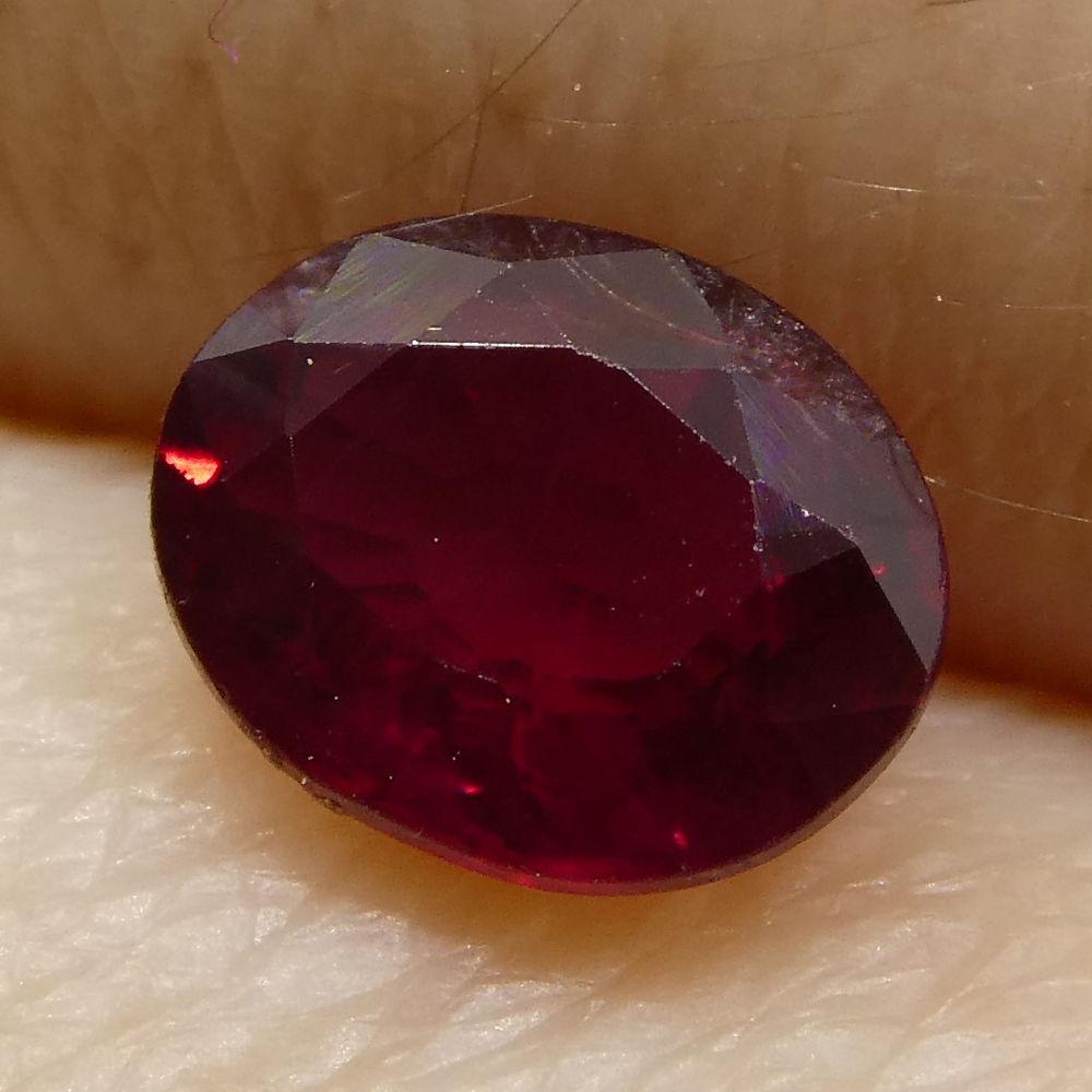 Description:

Gem Type: Ruby
Number of Stones: 1
Weight: 0.67 cts
Measurements: 5.72x4.72x2.59 mm
Shape: Oval
Cutting Style Crown: Modified Brilliant
Cutting Style Pavilion: Step Cut
Transparency: Transparent
Clarity: Moderately Included: Inclusions