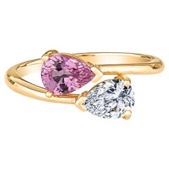 0.67ct Pear Shaped Diamond & 0.97ct Pear Shaped Pink Sapphire Toi Et Moi Ring