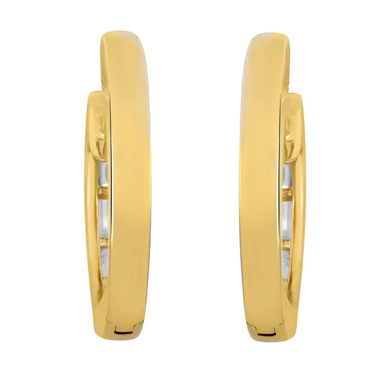 Discover sophistication in simplicity with these timeless diamond huggie earrings, ideal for elevating your everyday style. Crafted in radiant 18K yellow gold, they boast a row of four dazzling baguette cut diamonds, elegantly channel set to enhance