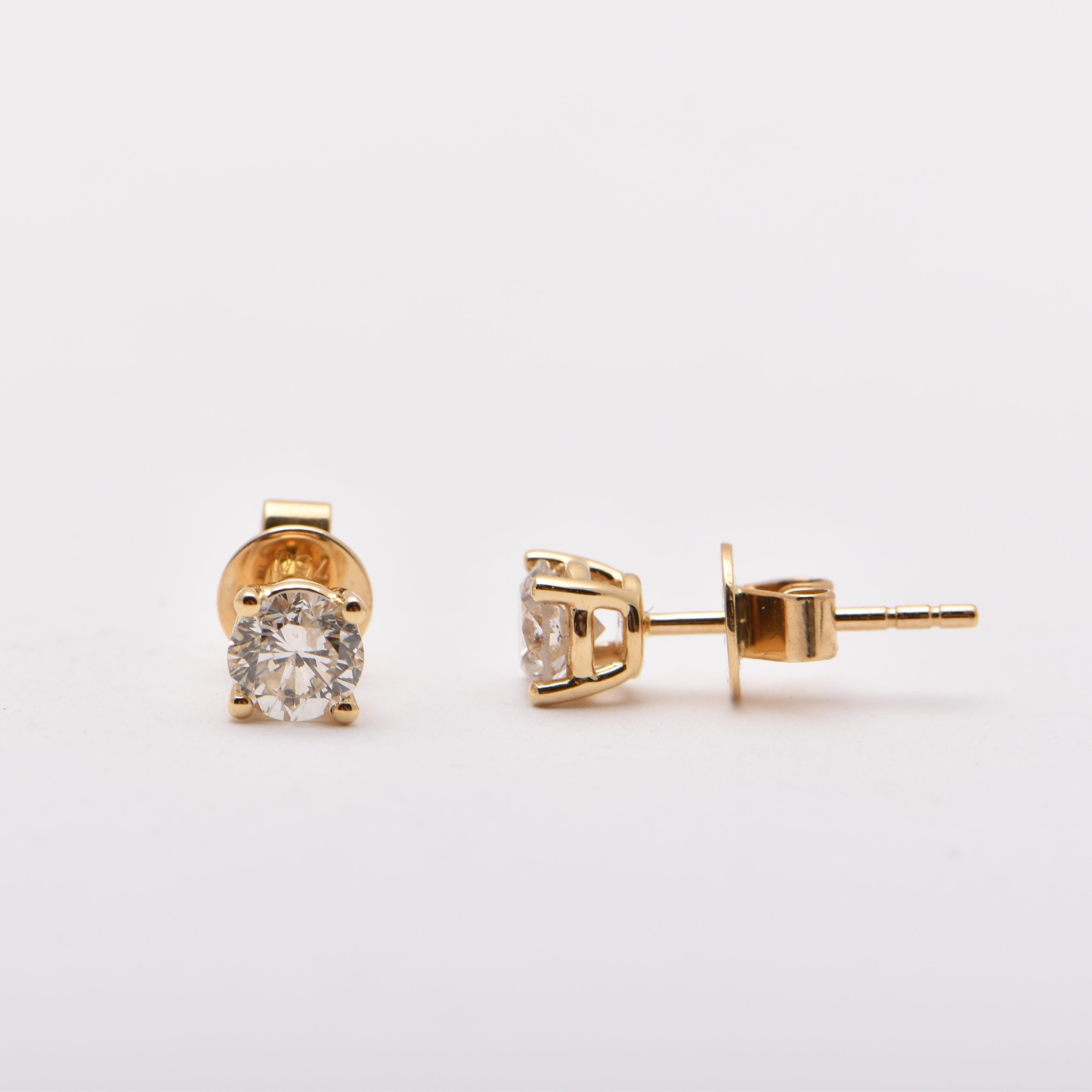 0.68 Carat Diamond Studs in 18 Carat Yellow Gold by Cartmer Jewellery   

2 Diamonds totalling 0.68 carats 

FREE express postage usually 3-4 days Sydney to New York  
FREE international insurance  
by Cartmer Jewellery, The Dymocks Building, Sydney