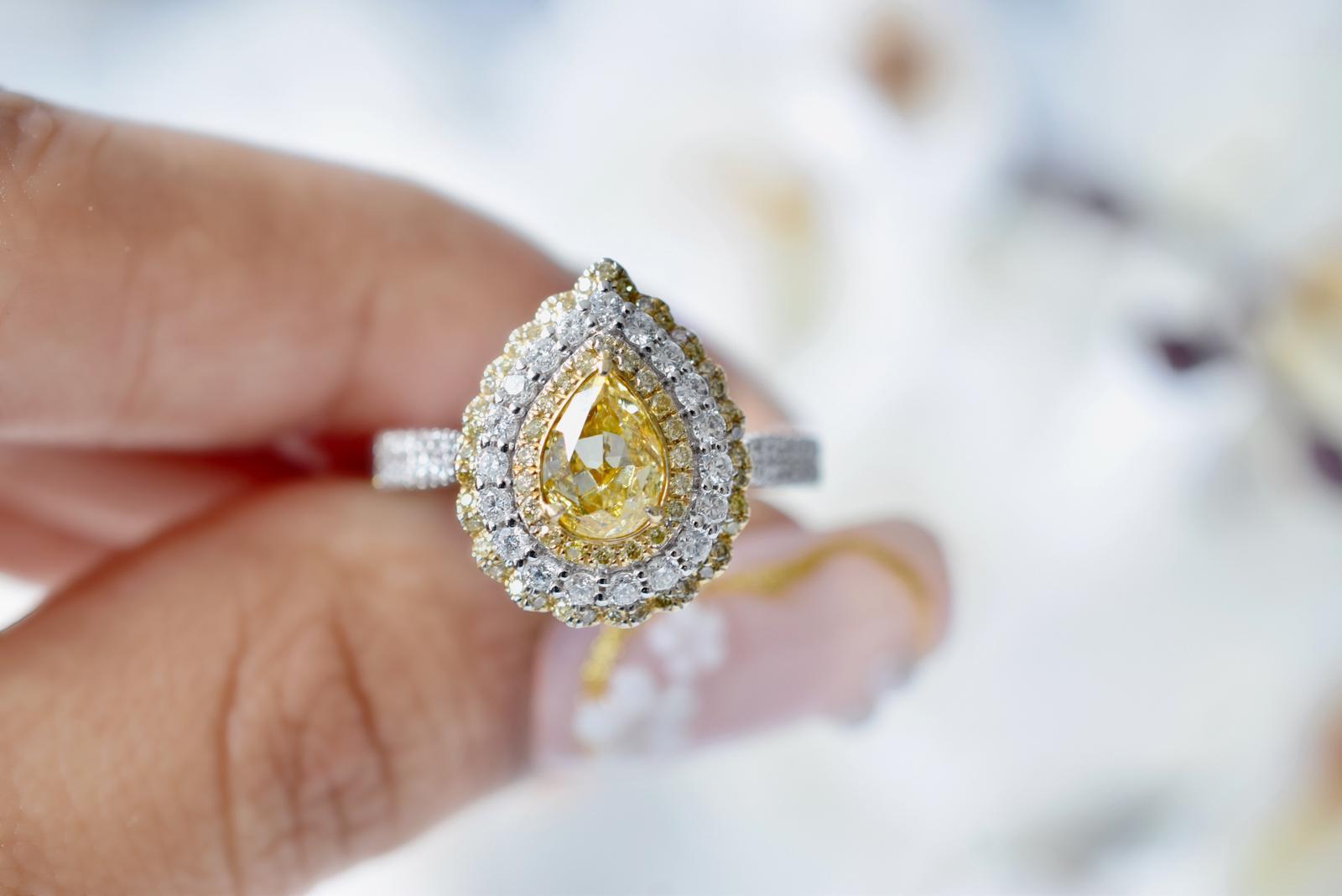 **100% NATURAL FANCY COLOUR DIAMOND JEWELLERIES**

✪ Jewelry Details ✪

♦ MAIN STONE DETAILS

➛ Stone Shape: Pear
➛ Stone Color: Fancy Light Yellow
➛ Stone Weight: 0.68 carats
➛ GIA certified

♦ SIDE STONE DETAILS 

➛ Side Yellow diamonds - 59 pcs