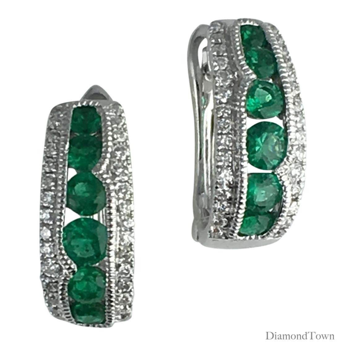 (DiamondTown) These handcrafted hoop stud earrings feature 0.68 carats fine emerald, tucked inside an outline of 0.24 carats white diamonds. The earrings close securely by lever-back.

Many of our items have matching companion pieces. Please
