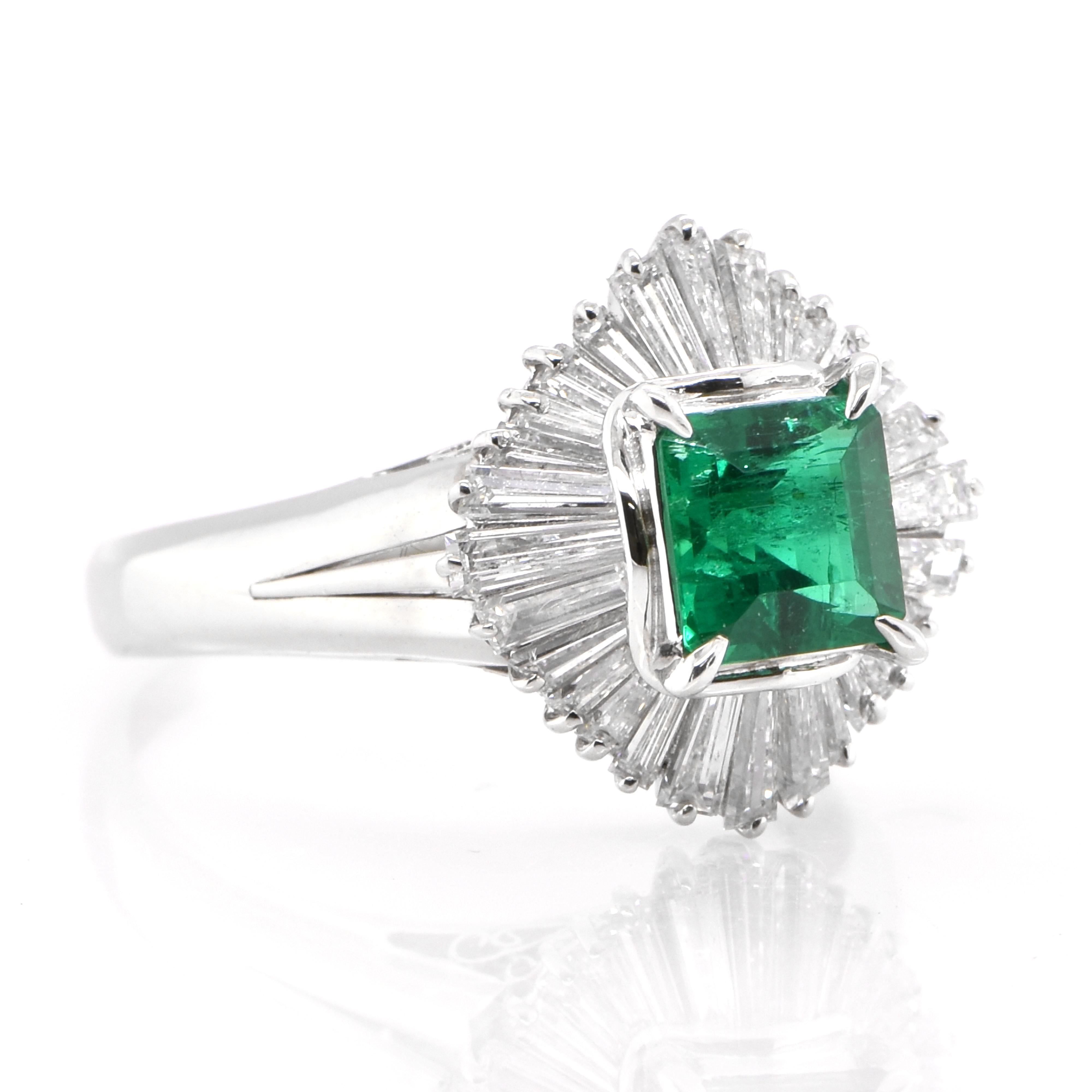 A stunning Vintage Ballerina Ring featuring a 0.68 Carat Natural Emerald and 0.80 Carats of Diamond Accents set in Platinum. People have admired emerald’s green for thousands of years. Emeralds have always been associated with the lushest landscapes