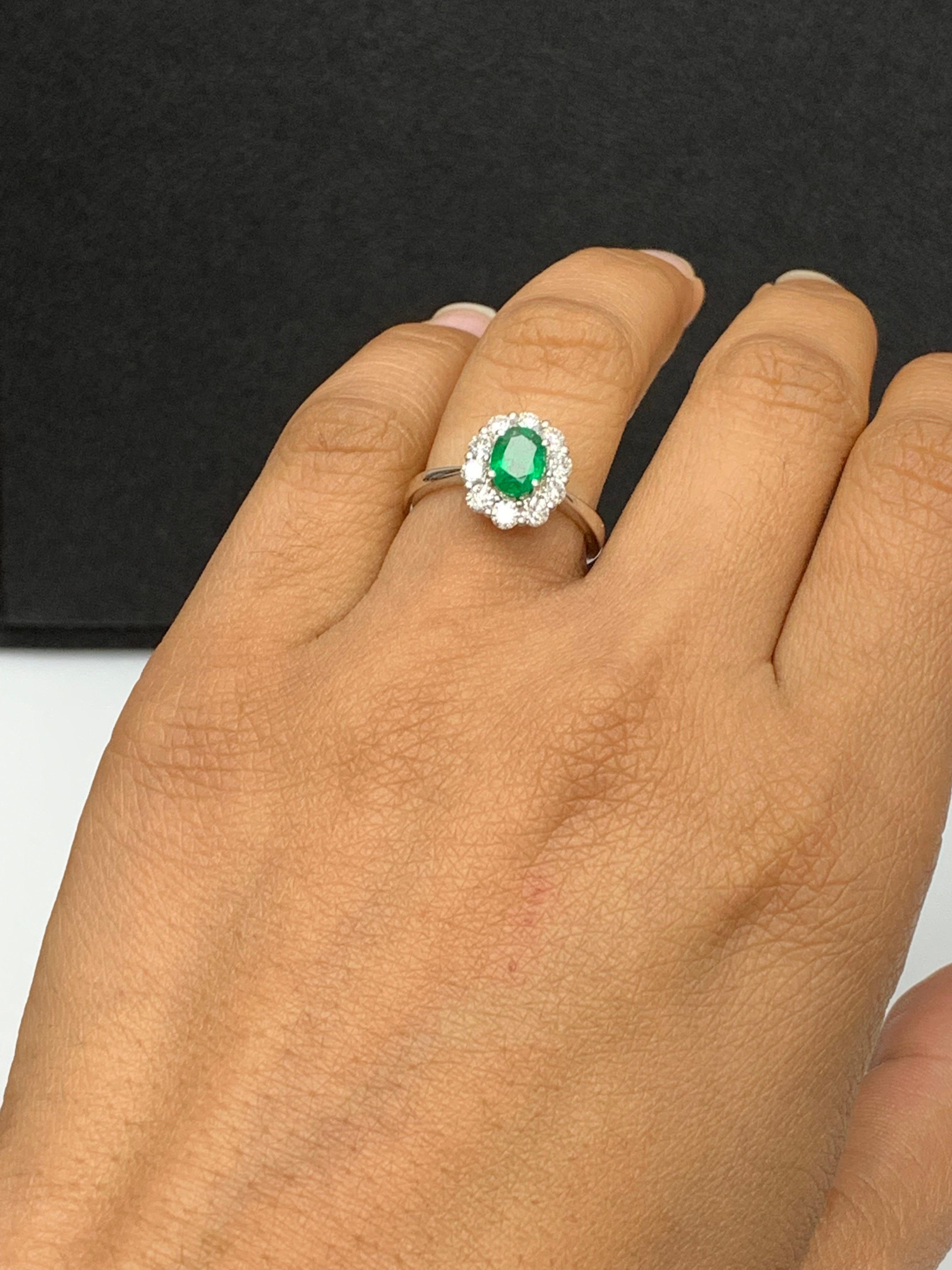 0.68 Carat Oval Cut Emerald and Diamond Ring in 18k White Gold For Sale 2