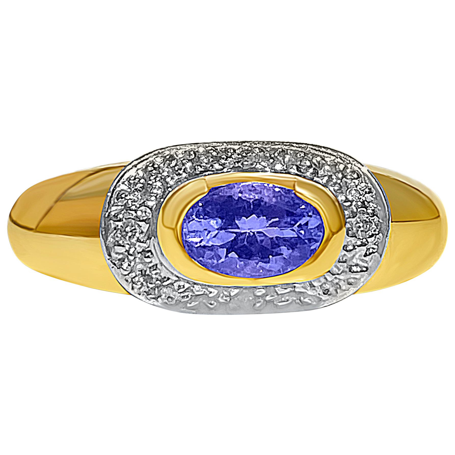 0.68 Carat Oval-Cut Tanzanite and 14 Karat Yellow Gold Engagement Ring For Sale