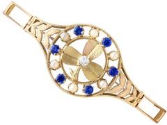 Bracelet en or jaune 18 carats, saphir de 0,68 carat, diamant de 0,15 carat, perle naturelle