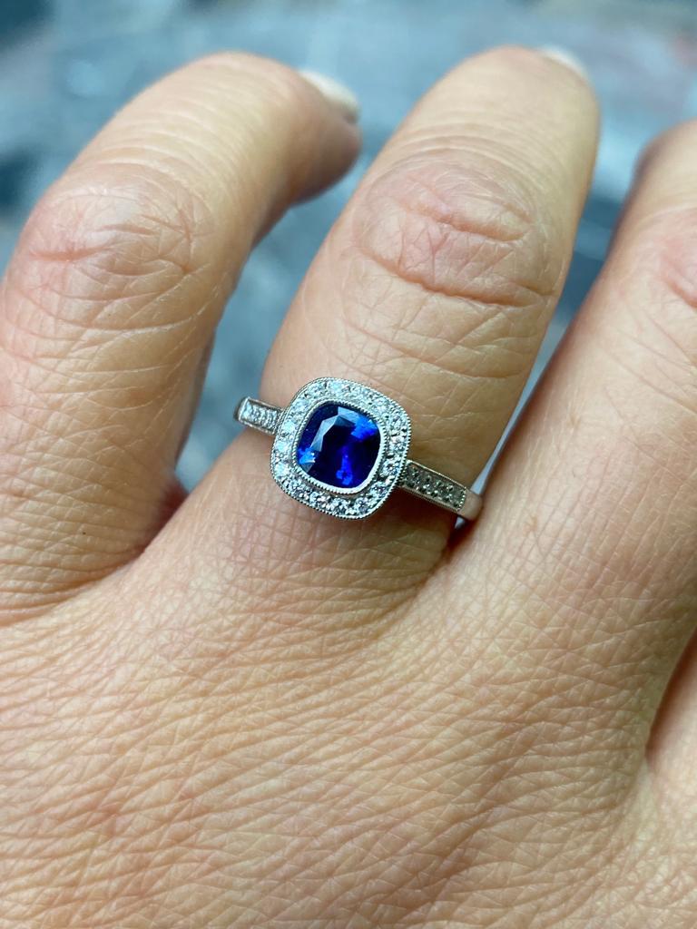 Cushion Cut 0.68 Carat Sapphire and Diamond Cluster Platinum Engagement Ring For Sale